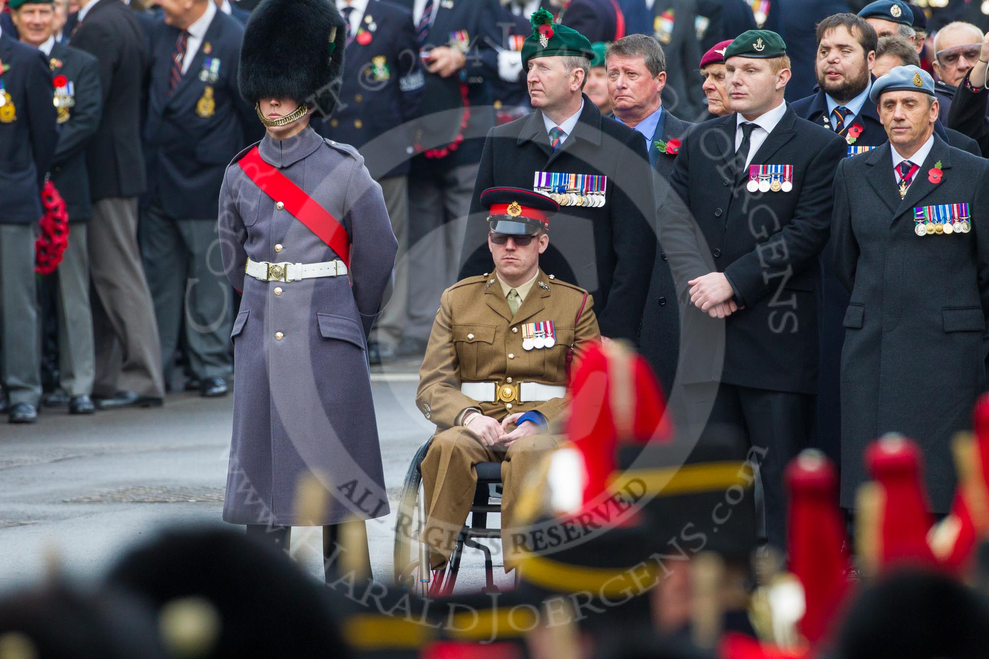 Remembrance Sunday at the Cenotaph in London 2014: The central column of the veterans waiting for the March Past.
Press stand opposite the Foreign Office building, Whitehall, London SW1,
London,
Greater London,
United Kingdom,
on 09 November 2014 at 10:42, image #85