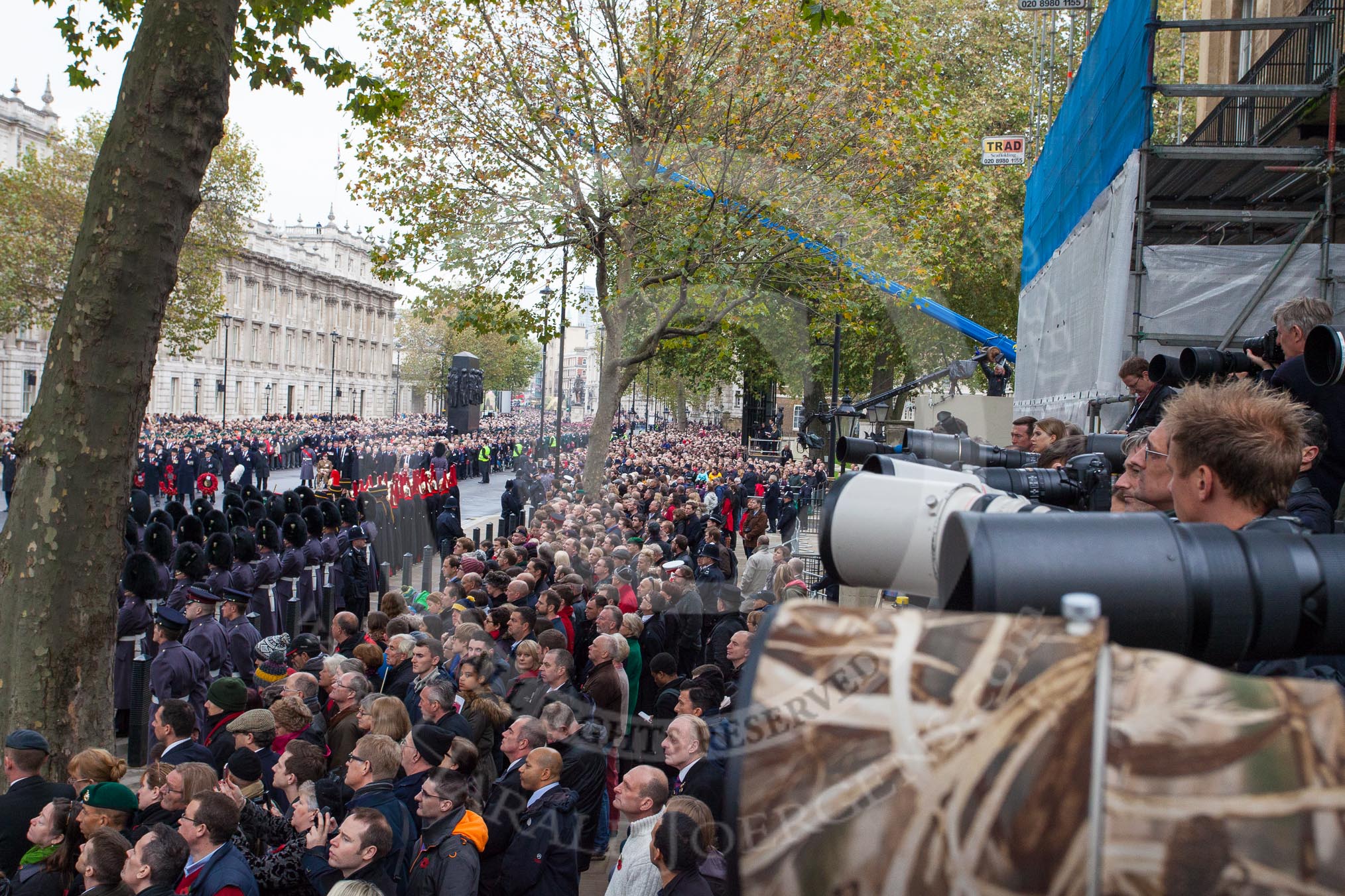 Remembrance Sunday at the Cenotaph in London 2014: The press stand on the southern side of Whitehall shortly before the start of the event.
Press stand opposite the Foreign Office building, Whitehall, London SW1,
London,
Greater London,
United Kingdom,
on 09 November 2014 at 10:53, image #94