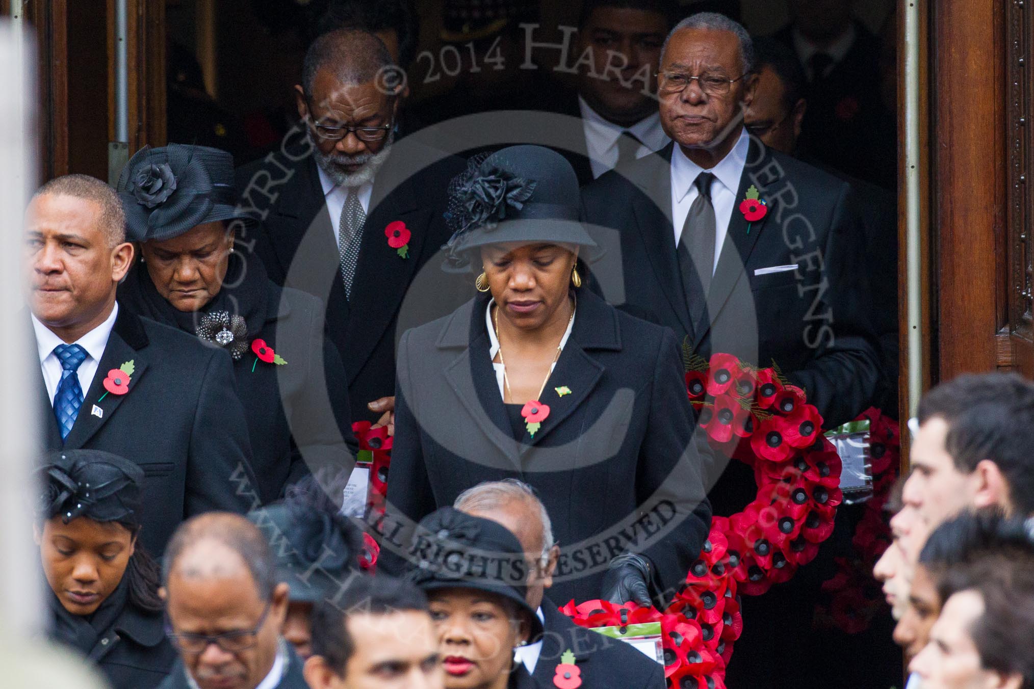Photo 1411091056231D43744HaraldJoergens Remembrance Sunday at the Cenotaph in London 2014: The High Commissioners emerging from the door of the Foreign- and Commonwealth Office.
Press stand opposite the Foreign Office building, Whitehall, London SW1,
London,
Greater London,
United Kingdom,
on 09 November 2014 at 10:56, image #129