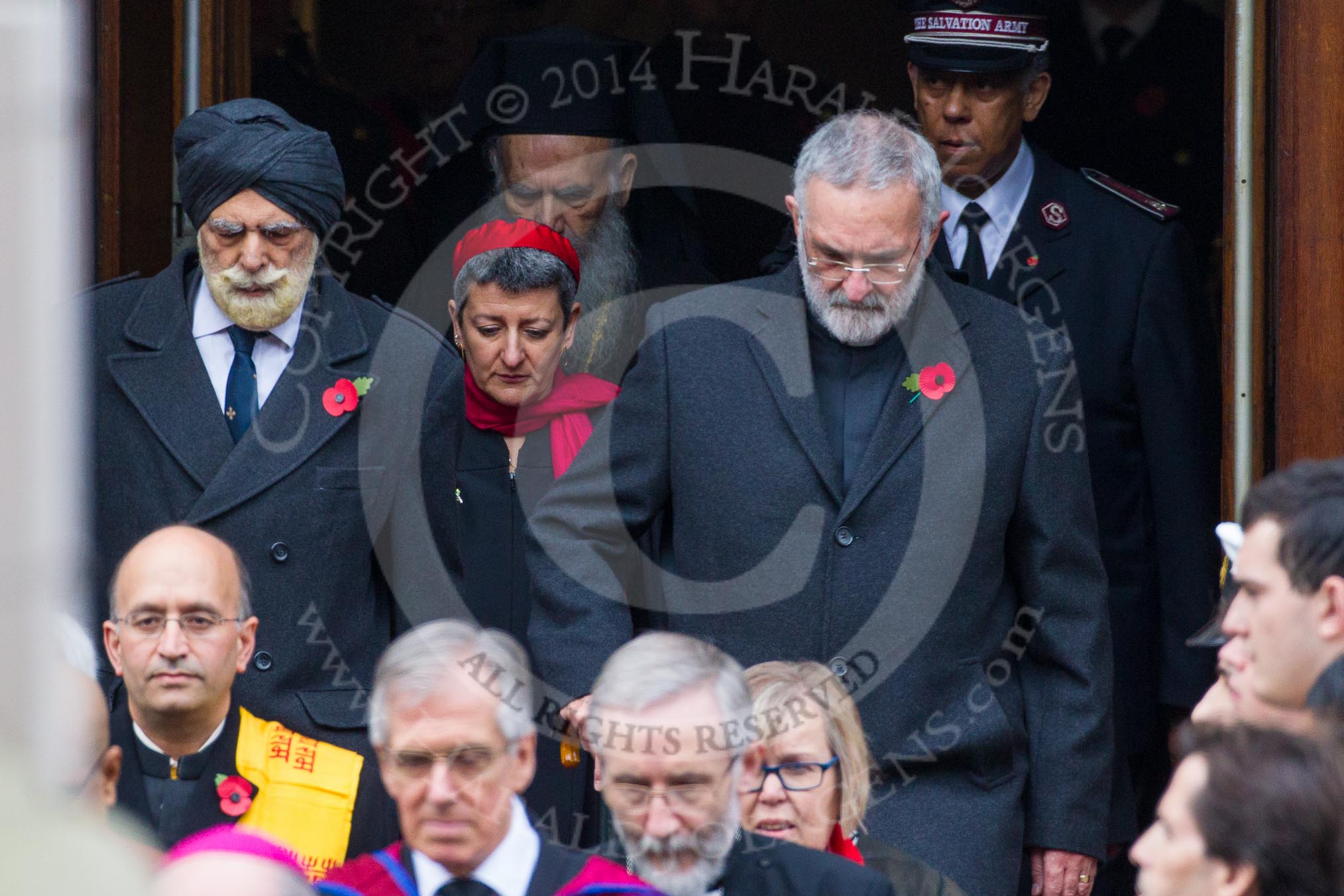Remembrance Sunday at the Cenotaph in London 2014: The leaders of the faith communities emerging from the door of the Foreign- and Commonwealth Office.
Press stand opposite the Foreign Office building, Whitehall, London SW1,
London,
Greater London,
United Kingdom,
on 09 November 2014 at 10:57, image #139