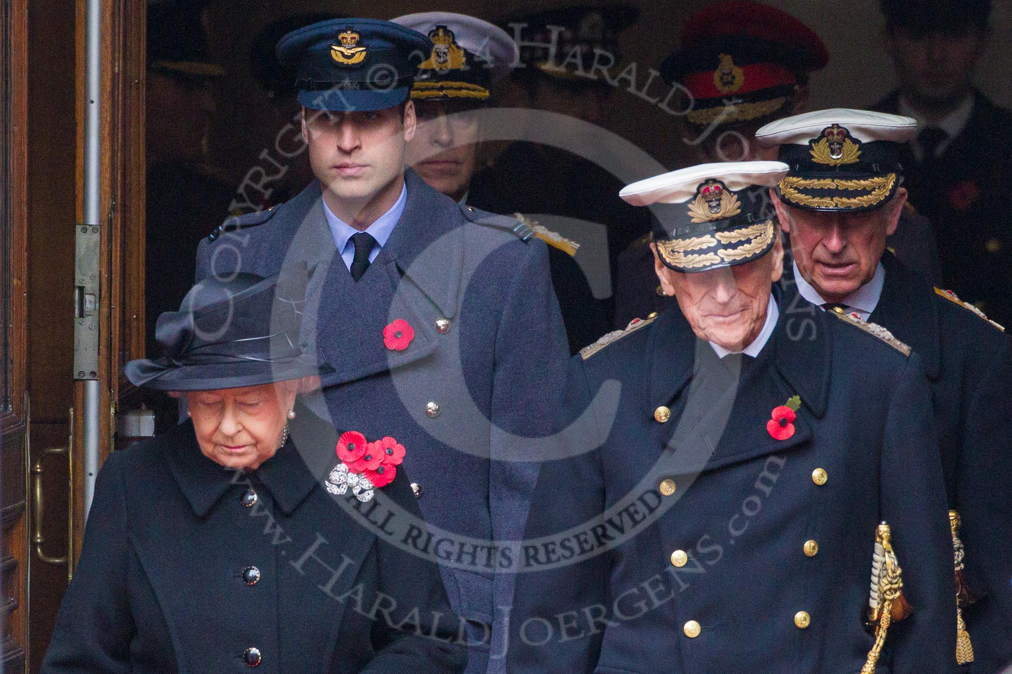 Remembrance Sunday at the Cenotaph in London 2014: Members of the Royal Family emerging from the Foreign- and Commonwealth Office - HM The Queen, HM The Duke of Edinburgh, HRH The Duke of Cambridge and HRH The Prince of Wales.
Press stand opposite the Foreign Office building, Whitehall, London SW1,
London,
Greater London,
United Kingdom,
on 09 November 2014 at 10:58, image #141