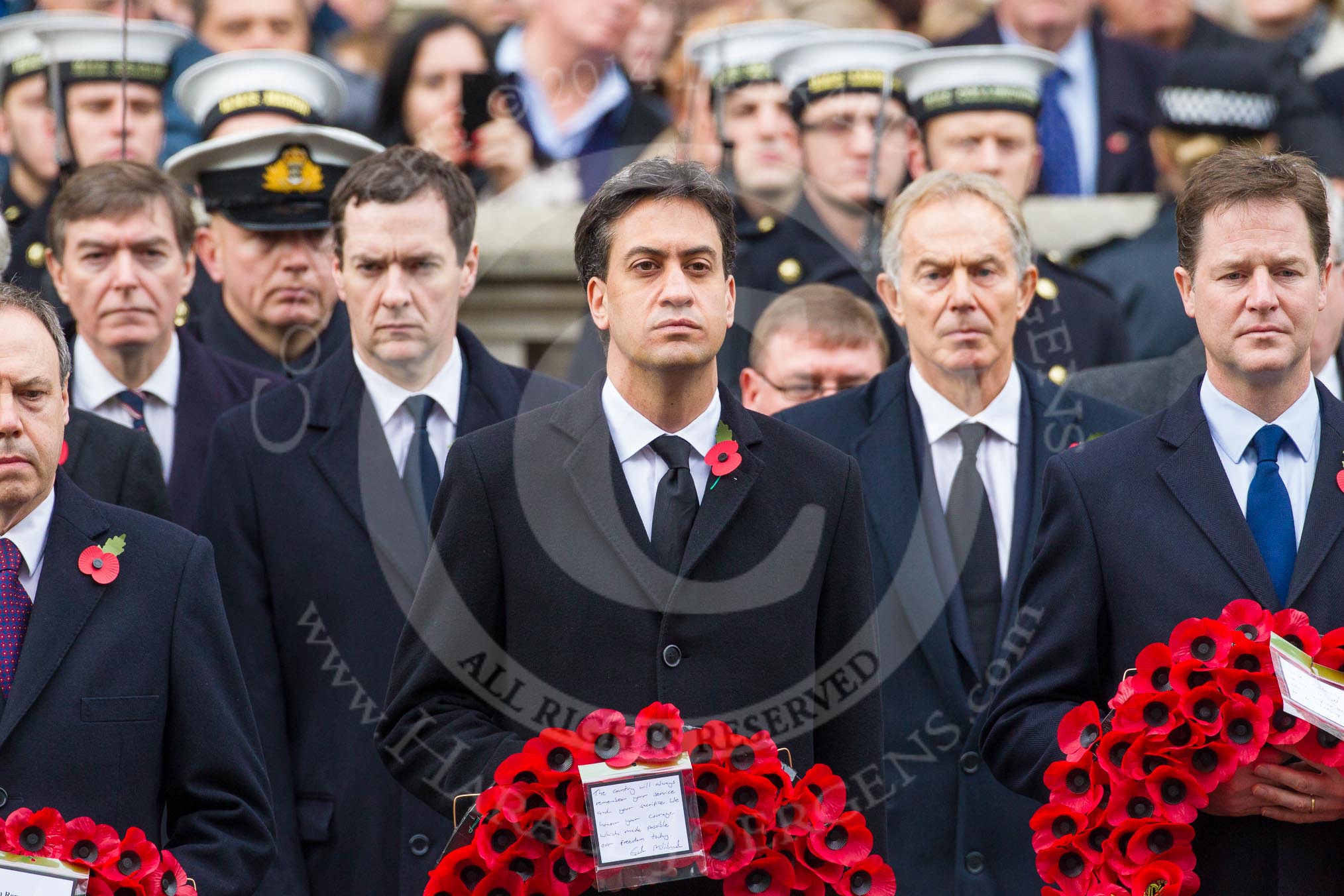 Remembrance Sunday at the Cenotaph in London 2014: Nigel Dodds MP (Westminster Democratic Unionist Party Leader), Ed Milliband as leader of the opposition, and Nick Clegg as Leader of the Liberal Democrats.
Press stand opposite the Foreign Office building, Whitehall, London SW1,
London,
Greater London,
United Kingdom,
on 09 November 2014 at 11:02, image #166
