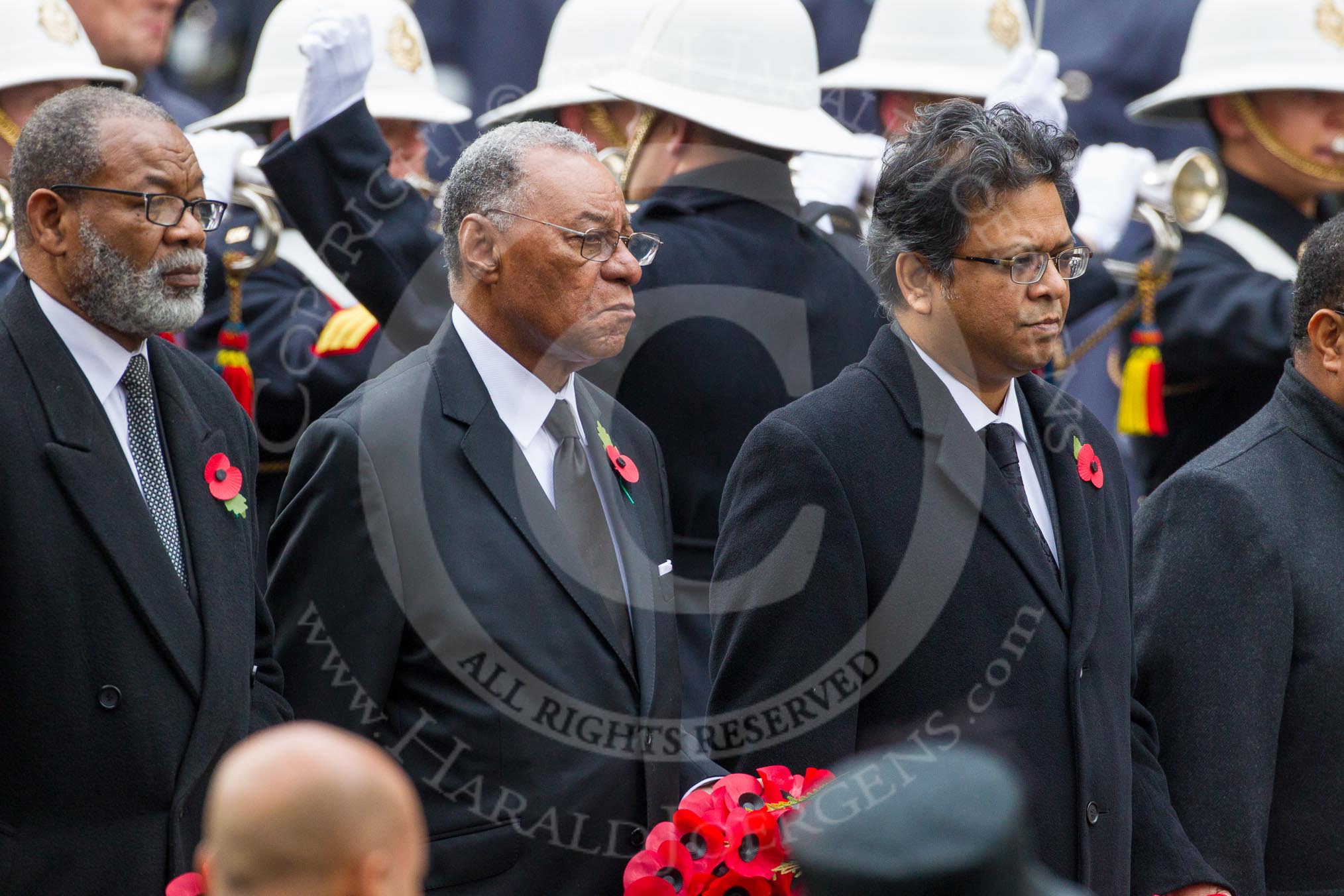 Remembrance Sunday at the Cenotaph in London 2014: The High Commissioner of Grenada, the High Commissioner of The Bahamas, and the High Commissioner of Bangladesh with their wreaths at the Cenotaph.
Press stand opposite the Foreign Office building, Whitehall, London SW1,
London,
Greater London,
United Kingdom,
on 09 November 2014 at 11:03, image #179
