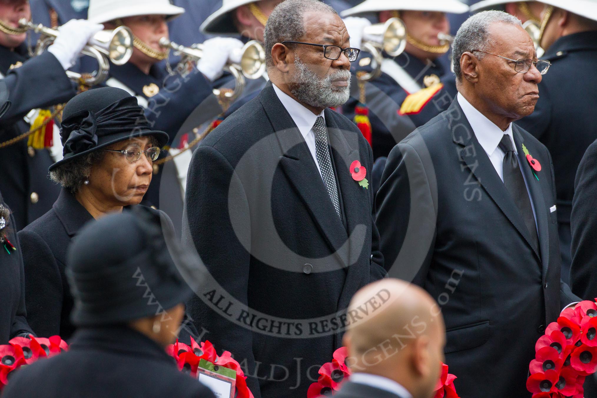 Remembrance Sunday at the Cenotaph in London 2014: The High Commissioner of Papua New Guinea, the High Commissioner of Grenana, and the High Commissioner of The Bahamas with their wreaths at the Cenotaph.
Press stand opposite the Foreign Office building, Whitehall, London SW1,
London,
Greater London,
United Kingdom,
on 09 November 2014 at 11:03, image #180