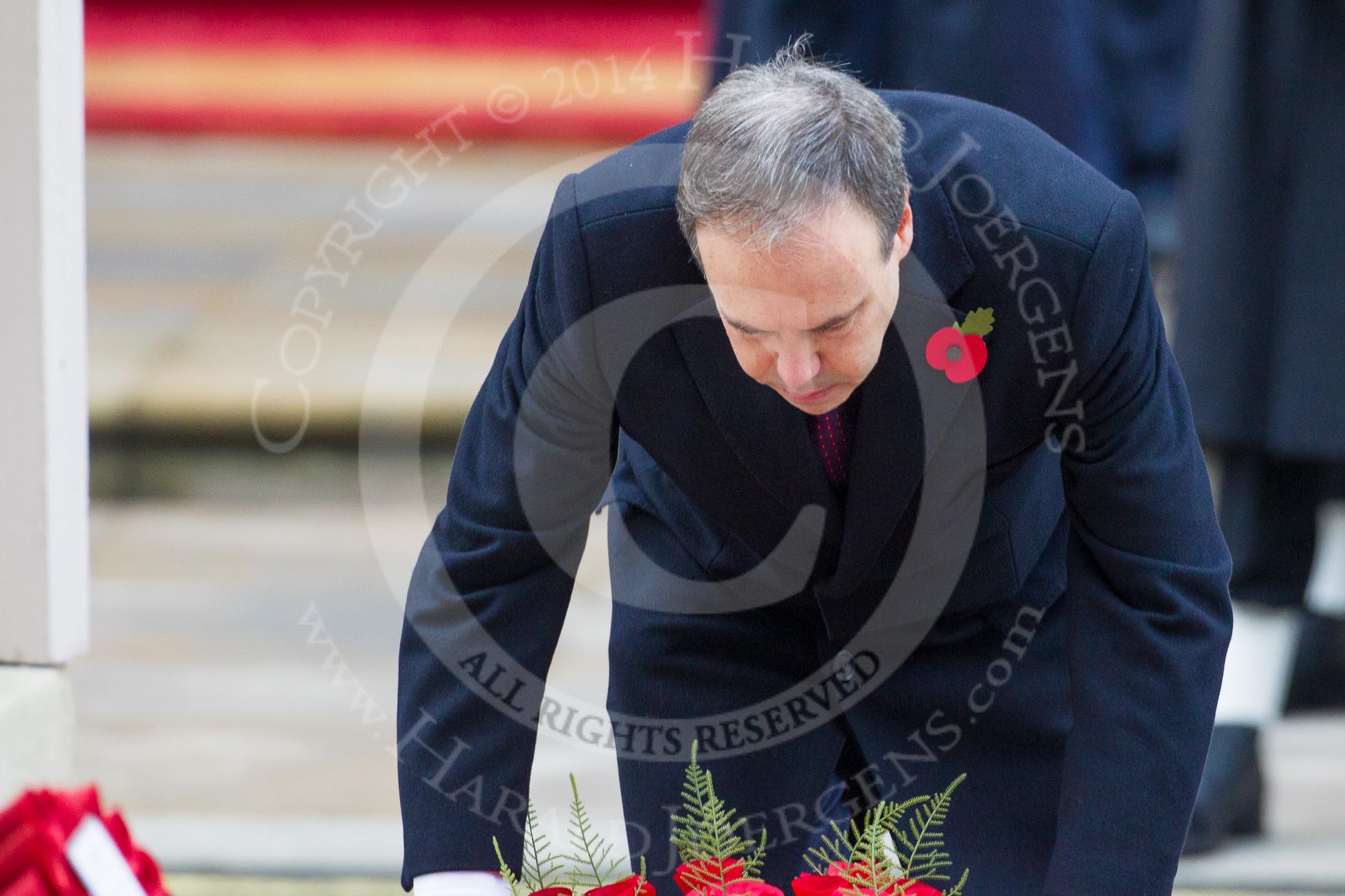Remembrance Sunday at the Cenotaph in London 2014: The leader of the Democratic Unionist Party, Nigel Dodds, laying his wreath at the Cenotaph.
Press stand opposite the Foreign Office building, Whitehall, London SW1,
London,
Greater London,
United Kingdom,
on 09 November 2014 at 11:08, image #231