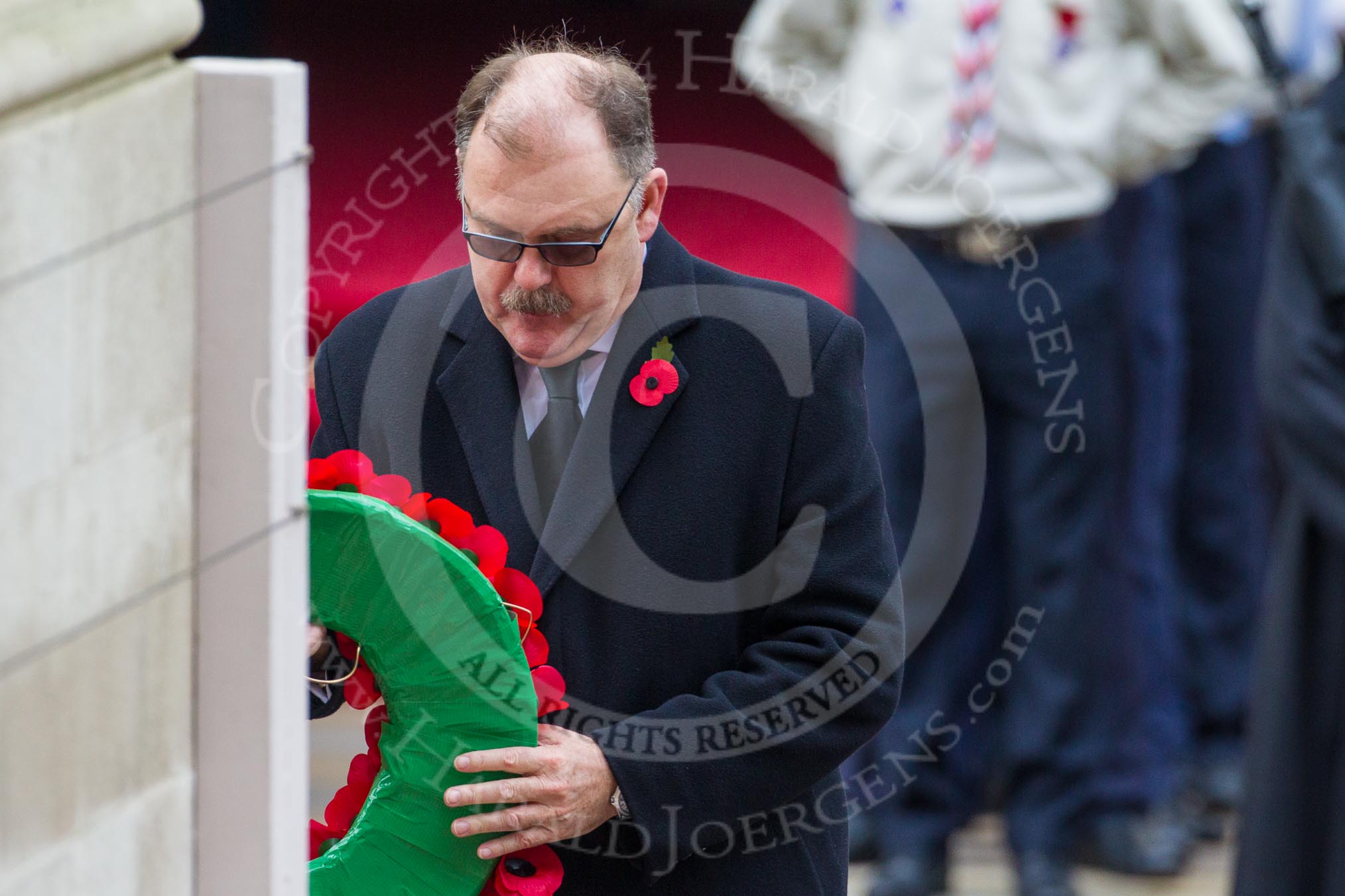 Remembrance Sunday at the Cenotaph in London 2014: Elfyn Llwyd, as leader of the Plaid Cymru / SNP Parliamentary Group, laying his wreath at the Cenotaph.
Press stand opposite the Foreign Office building, Whitehall, London SW1,
London,
Greater London,
United Kingdom,
on 09 November 2014 at 11:08, image #234