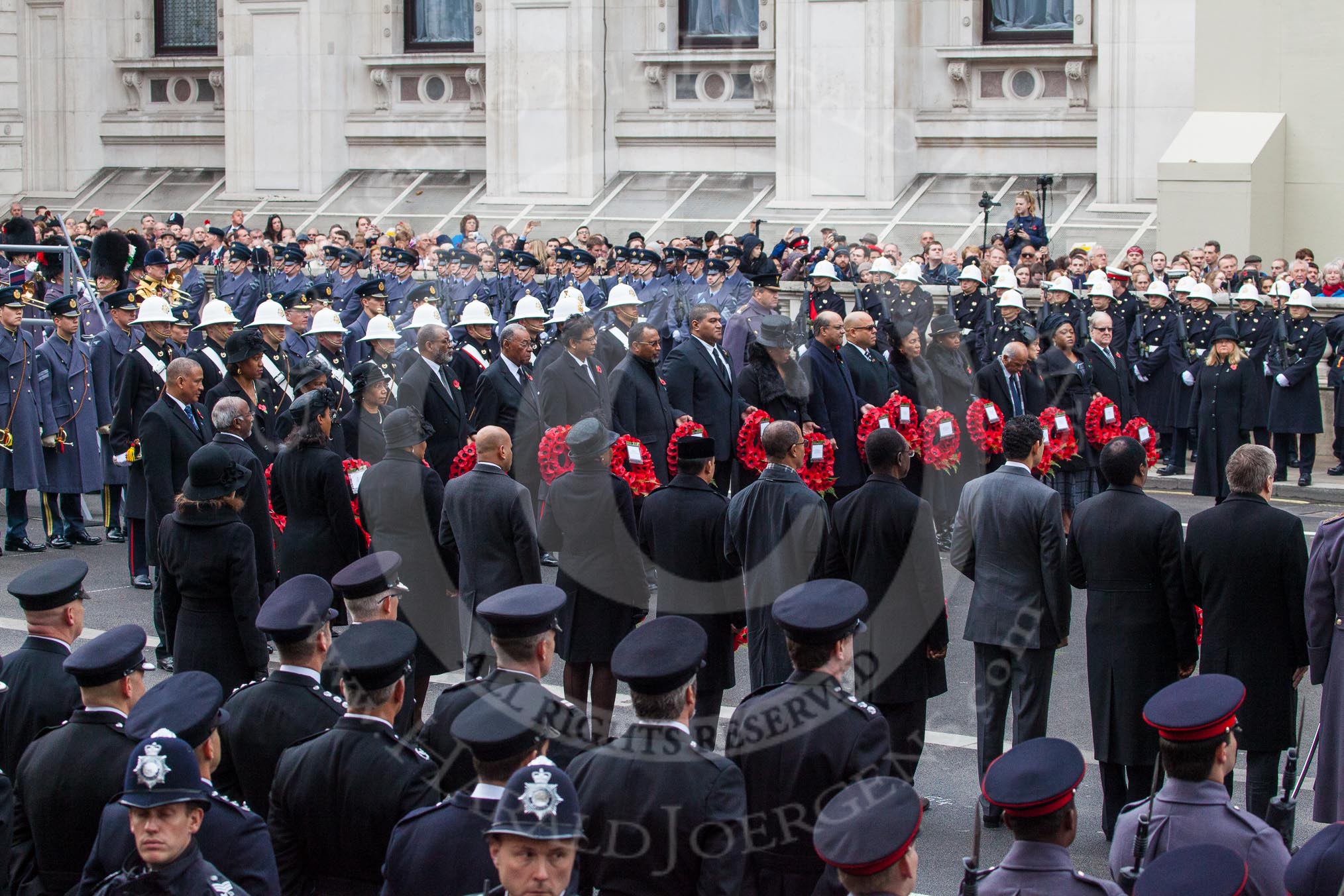 Remembrance Sunday at the Cenotaph in London 2014: The High Commissioners about to lay their wreaths.
Press stand opposite the Foreign Office building, Whitehall, London SW1,
London,
Greater London,
United Kingdom,
on 09 November 2014 at 11:10, image #240