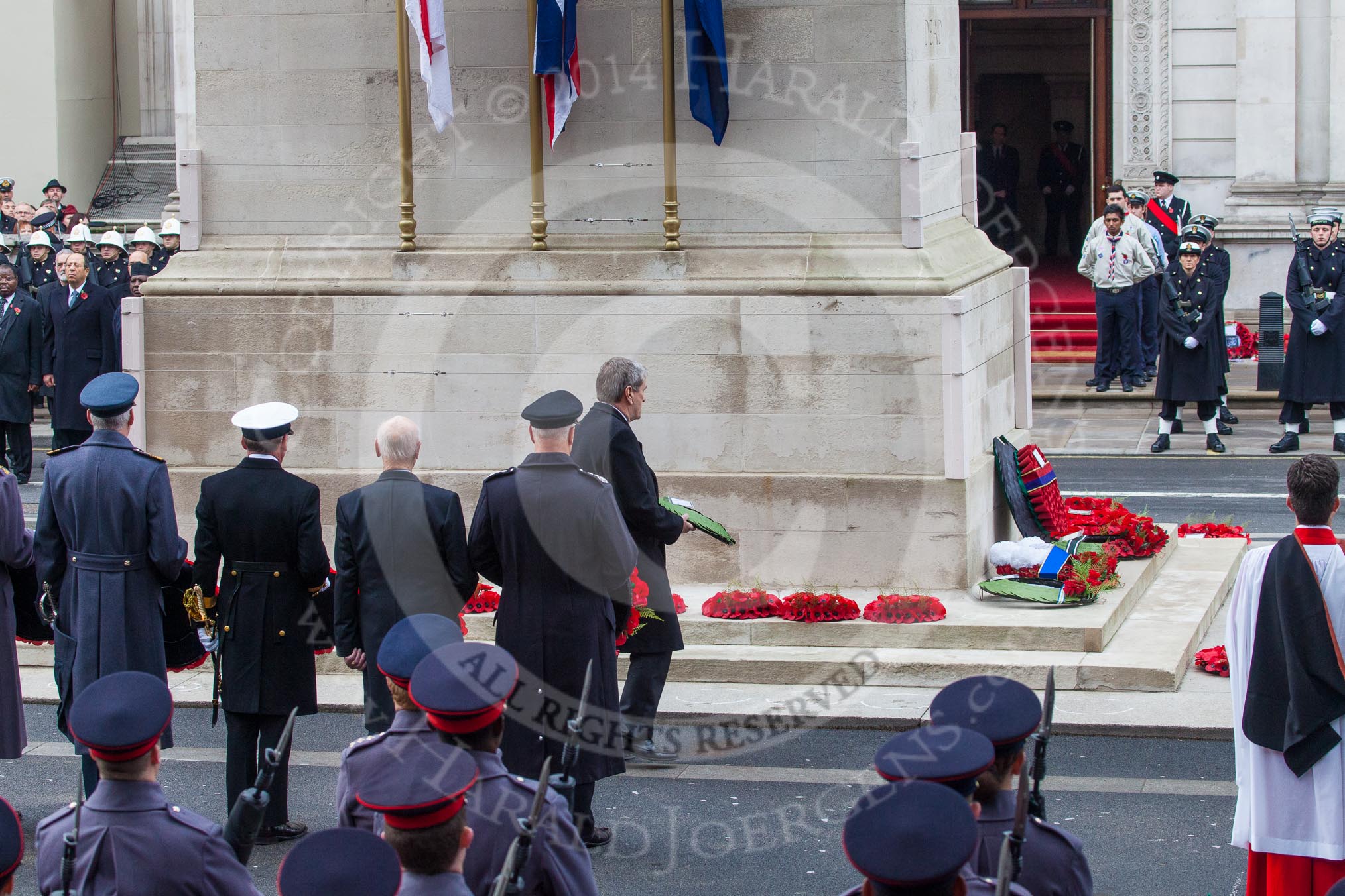 Remembrance Sunday at the Cenotaph in London 2014: The Ambassador of Ireland to Great Britain (?) laying his wreath at the Cenotaph.
Press stand opposite the Foreign Office building, Whitehall, London SW1,
London,
Greater London,
United Kingdom,
on 09 November 2014 at 11:13, image #256