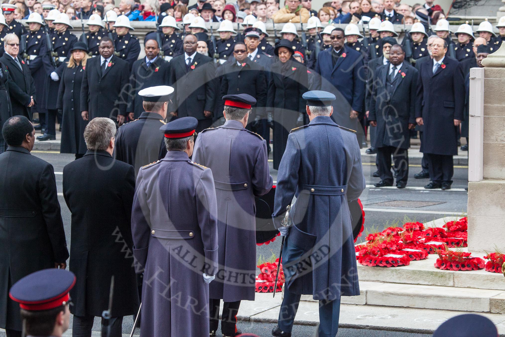 Remembrance Sunday at the Cenotaph in London 2014: Admiral Sir George Zambellas, representing the Royal Navy, General Sir Nicholas Houghton  as the Chief of the Defence Staff, and Air Chief Marshall Sir Andrew Pulford for the RAF laying their wreaths together.
Press stand opposite the Foreign Office building, Whitehall, London SW1,
London,
Greater London,
United Kingdom,
on 09 November 2014 at 11:14, image #258