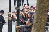 Remembrance Sunday at the Cenotaph in London 2014: Crowds waiting behind barriers at the eastern side of Whitehall..
Press stand opposite the Foreign Office building, Whitehall, London SW1,
London,
Greater London,
United Kingdom,
on 09 November 2014 at 08:13, image #4