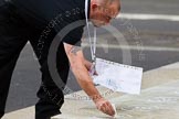 Remembrance Sunday at the Cenotaph in London 2014: Preparations for the event - the numbers for the individual wreaths to be laid are painted at the Cenotaph..
Press stand opposite the Foreign Office building, Whitehall, London SW1,
London,
Greater London,
United Kingdom,
on 09 November 2014 at 08:18, image #5