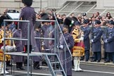 Remembrance Sunday at the Cenotaph in London 2014: The Household Division bands and the Director of Music, getting ready for the event.
Press stand opposite the Foreign Office building, Whitehall, London SW1,
London,
Greater London,
United Kingdom,
on 09 November 2014 at 10:35, image #78