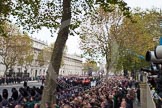 Remembrance Sunday at the Cenotaph in London 2014: Whitehall before the event, lines with large numbers of spectators and over ten thousand veterans waiting for the March Past.
Press stand opposite the Foreign Office building, Whitehall, London SW1,
London,
Greater London,
United Kingdom,
on 09 November 2014 at 10:53, image #93