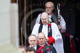 Remembrance Sunday at the Cenotaph in London 2014: The Sub-Dean of Her Majesty’s Chapels Royal, the Reverend Prebendary William Scott, leaving the Commonwealth- and Foreign Office, followed by the Bishop of London.
Press stand opposite the Foreign Office building, Whitehall, London SW1,
London,
Greater London,
United Kingdom,
on 09 November 2014 at 10:53, image #100