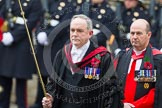 Remembrance Sunday at the Cenotaph in London 2014: The Serjeant of the Vestry, David Baldwin, followed by the Chaplain General to HM Land Forces, Reverend Dr David George Coulter.
Press stand opposite the Foreign Office building, Whitehall, London SW1,
London,
Greater London,
United Kingdom,
on 09 November 2014 at 10:54, image #110