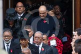 Remembrance Sunday at the Cenotaph in London 2014: The High Commissioners emerging from the door of the Foreign- and Commonwealth Office.
Press stand opposite the Foreign Office building, Whitehall, London SW1,
London,
Greater London,
United Kingdom,
on 09 November 2014 at 10:56, image #131