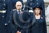 Remembrance Sunday at the Cenotaph in London 2014: Culture Secretary Sajid Javid and the Lord Speaker, Baroness D'Souza.
Press stand opposite the Foreign Office building, Whitehall, London SW1,
London,
Greater London,
United Kingdom,
on 09 November 2014 at 11:02, image #161