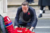 Remembrance Sunday at the Cenotaph in London 2014: The Prime Minister, the Rt Hon David Cameron, laying a wreath at the Cenotaph.
Press stand opposite the Foreign Office building, Whitehall, London SW1,
London,
Greater London,
United Kingdom,
on 09 November 2014 at 11:07, image #220