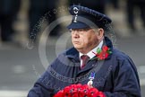 Remembrance Sunday at the Cenotaph in London 2014: The representative of Transport for London walking towards the Cenotaph with his wreath.
Press stand opposite the Foreign Office building, Whitehall, London SW1,
London,
Greater London,
United Kingdom,
on 09 November 2014 at 11:27, image #313