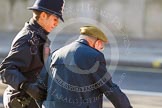 Remembrance Sunday at the Cenotaph in London 2014: An elderly gentleman lays a wreath, with thousands of spectators clapping.
Press stand opposite the Foreign Office building, Whitehall, London SW1,
London,
Greater London,
United Kingdom,
on 09 November 2014 at 12:42, image #327