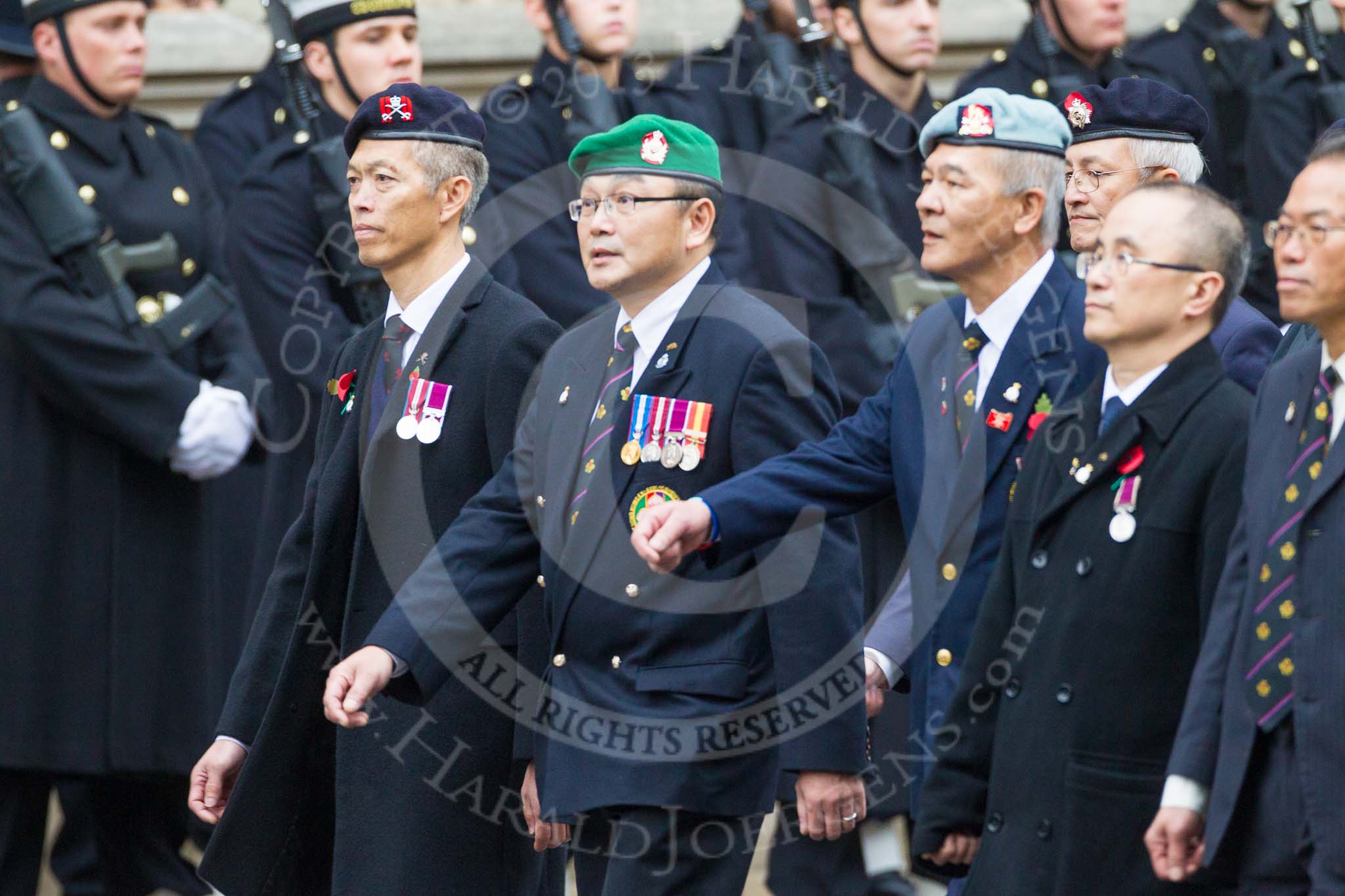 Remembrance Sunday at the Cenotaph 2015: Group D25, Hong Kong Ex-Servicemen's Association (UK Branch).
Cenotaph, Whitehall, London SW1,
London,
Greater London,
United Kingdom,
on 08 November 2015 at 11:55, image #730
