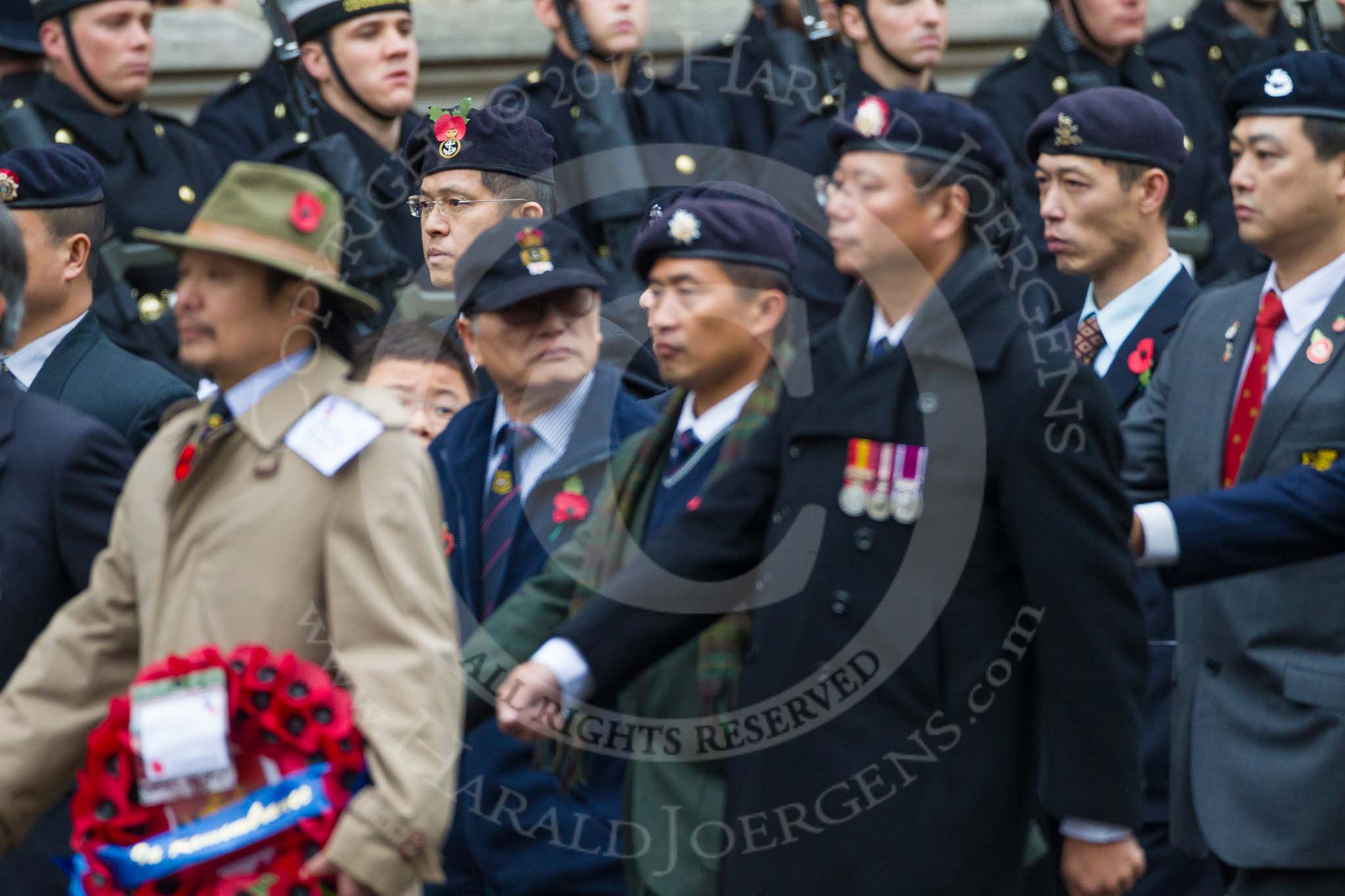 Remembrance Sunday at the Cenotaph 2015: Group D25, Hong Kong Ex-Servicemen's Association (UK Branch).
Cenotaph, Whitehall, London SW1,
London,
Greater London,
United Kingdom,
on 08 November 2015 at 11:55, image #731