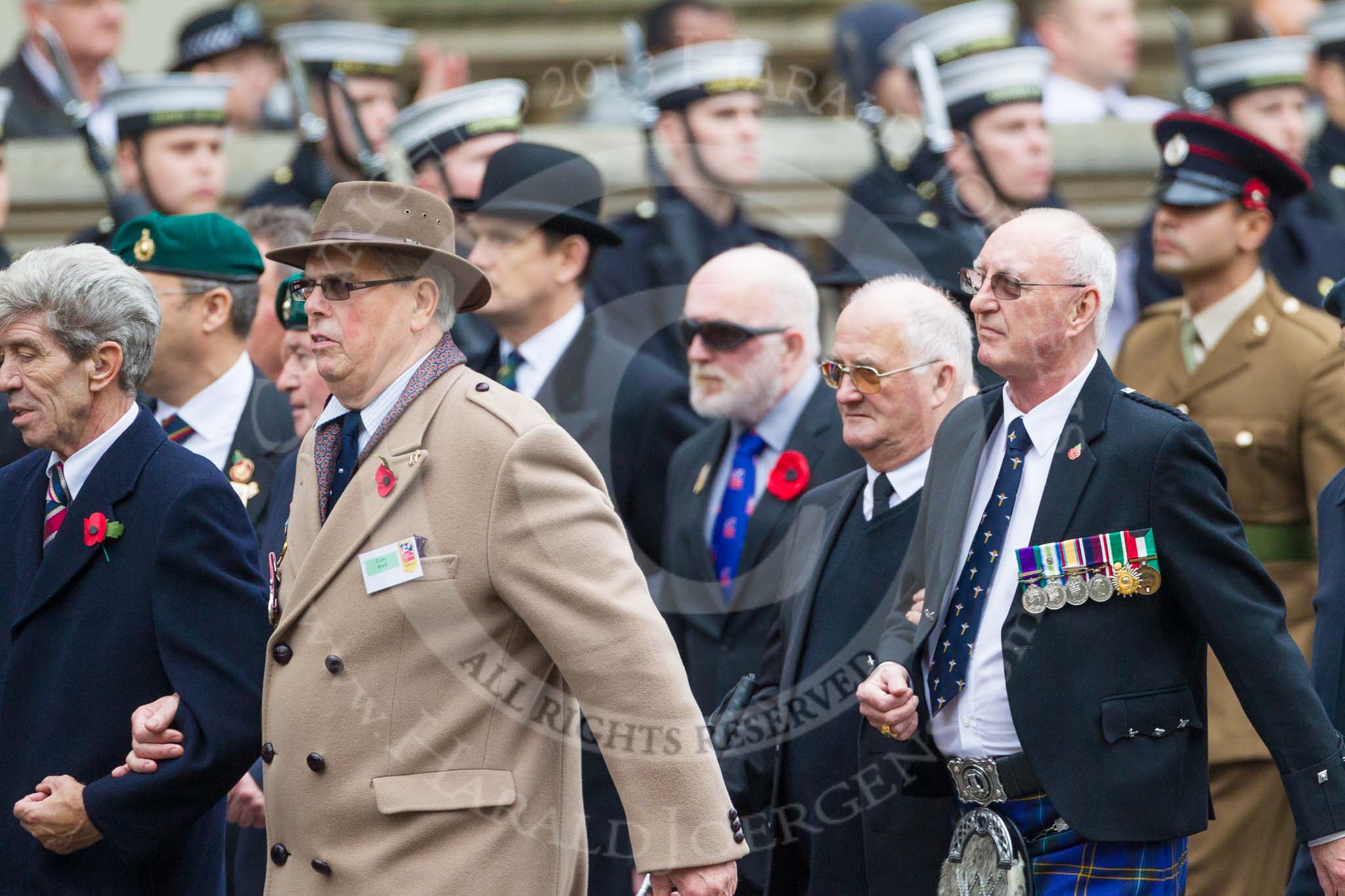 Remembrance Sunday at the Cenotaph 2015: Group F1, Blind Veterans UK.
Cenotaph, Whitehall, London SW1,
London,
Greater London,
United Kingdom,
on 08 November 2015 at 11:57, image #760