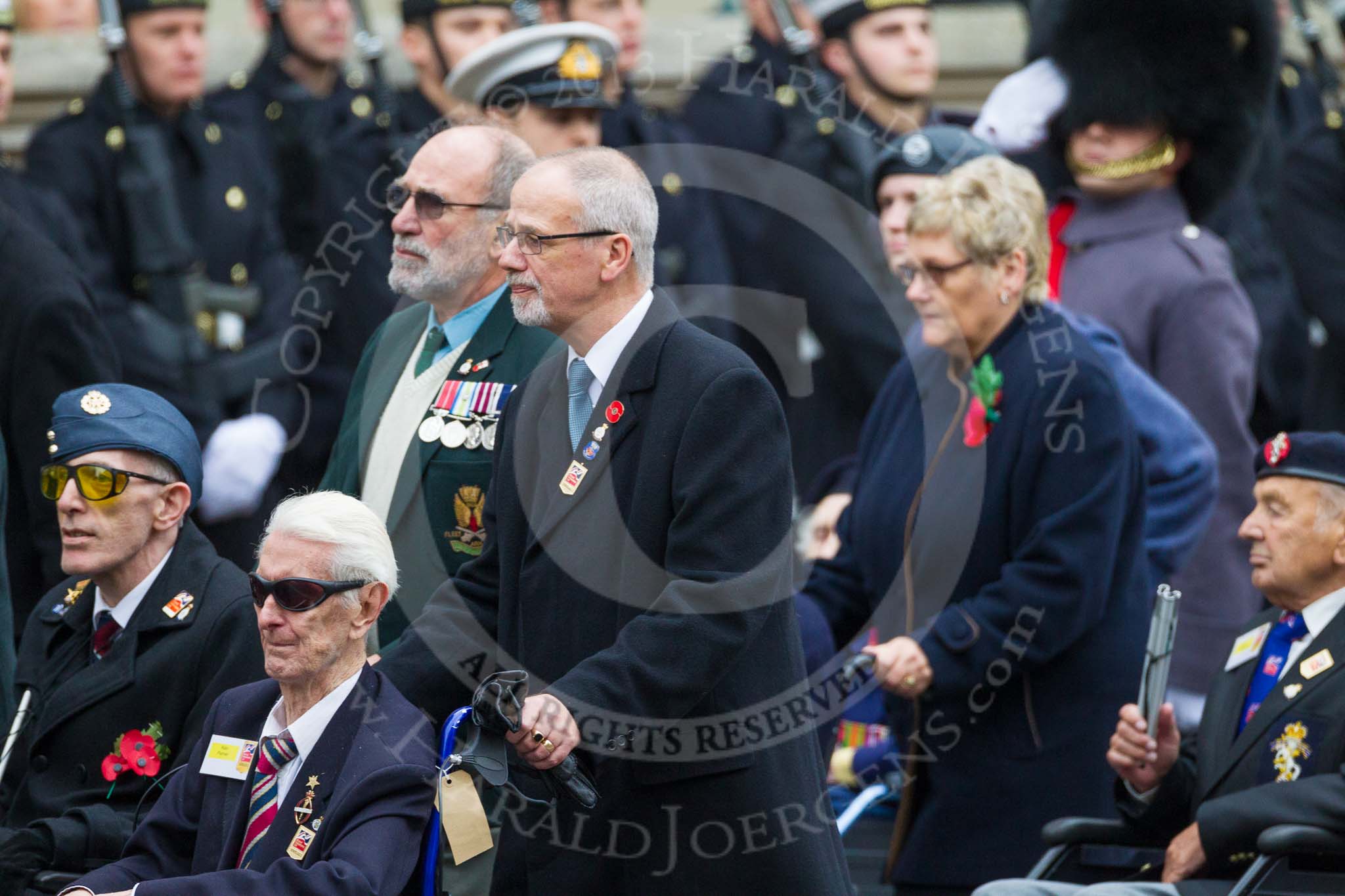 Remembrance Sunday at the Cenotaph 2015: Group F1, Blind Veterans UK.
Cenotaph, Whitehall, London SW1,
London,
Greater London,
United Kingdom,
on 08 November 2015 at 11:57, image #787