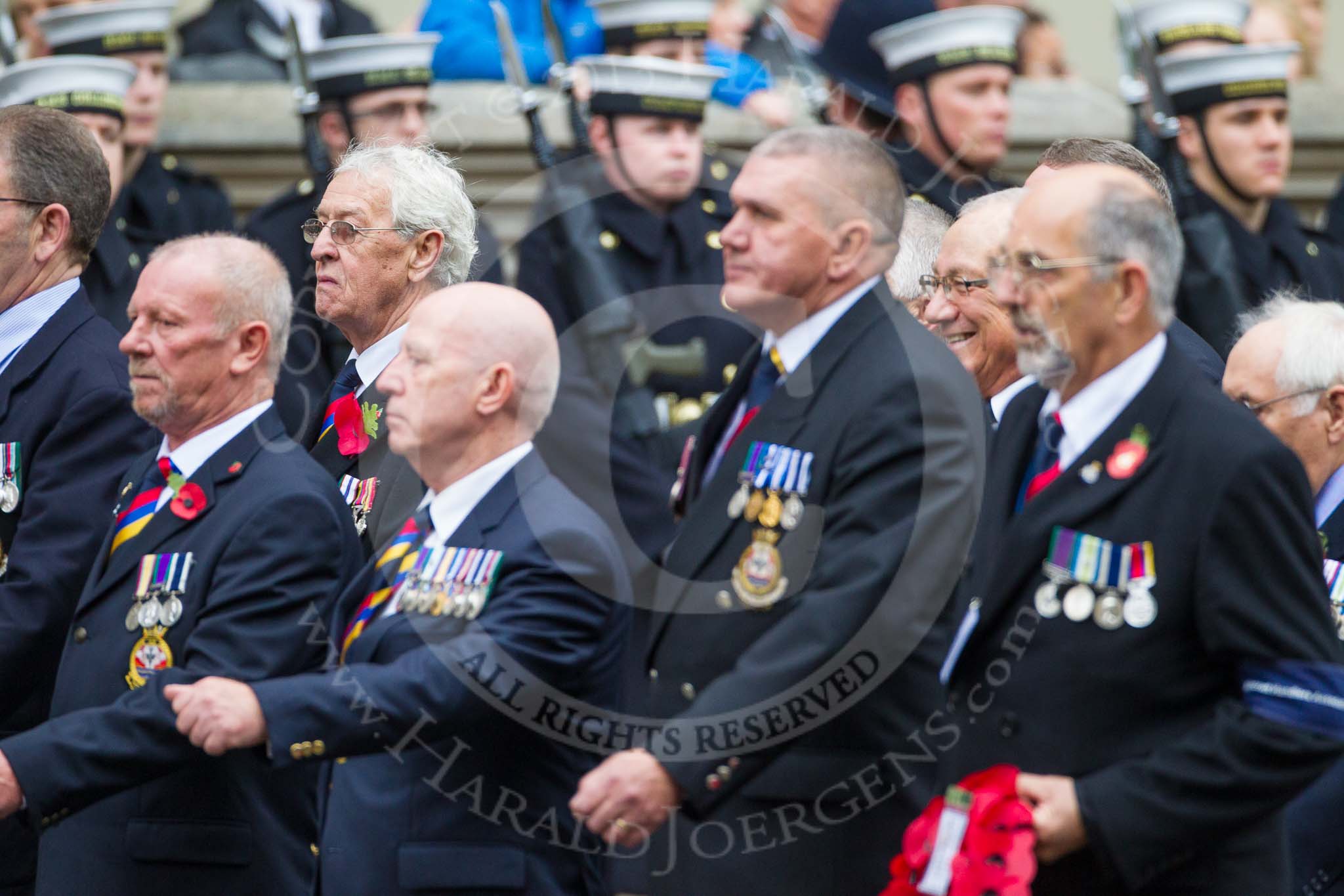Remembrance Sunday at the Cenotaph 2015: Group E28, Aircraft Handlers Association.
Cenotaph, Whitehall, London SW1,
London,
Greater London,
United Kingdom,
on 08 November 2015 at 12:02, image #952
