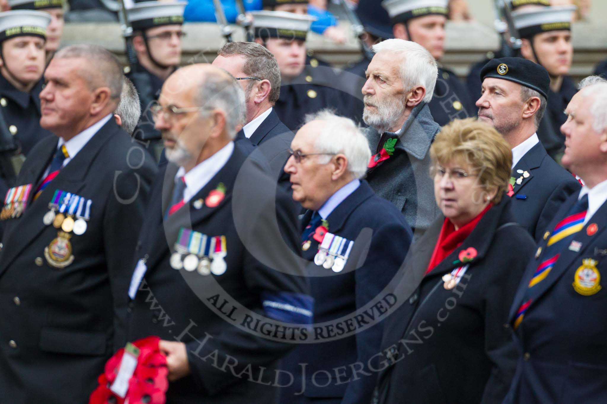 Remembrance Sunday at the Cenotaph 2015: Group E28, Aircraft Handlers Association.
Cenotaph, Whitehall, London SW1,
London,
Greater London,
United Kingdom,
on 08 November 2015 at 12:02, image #953