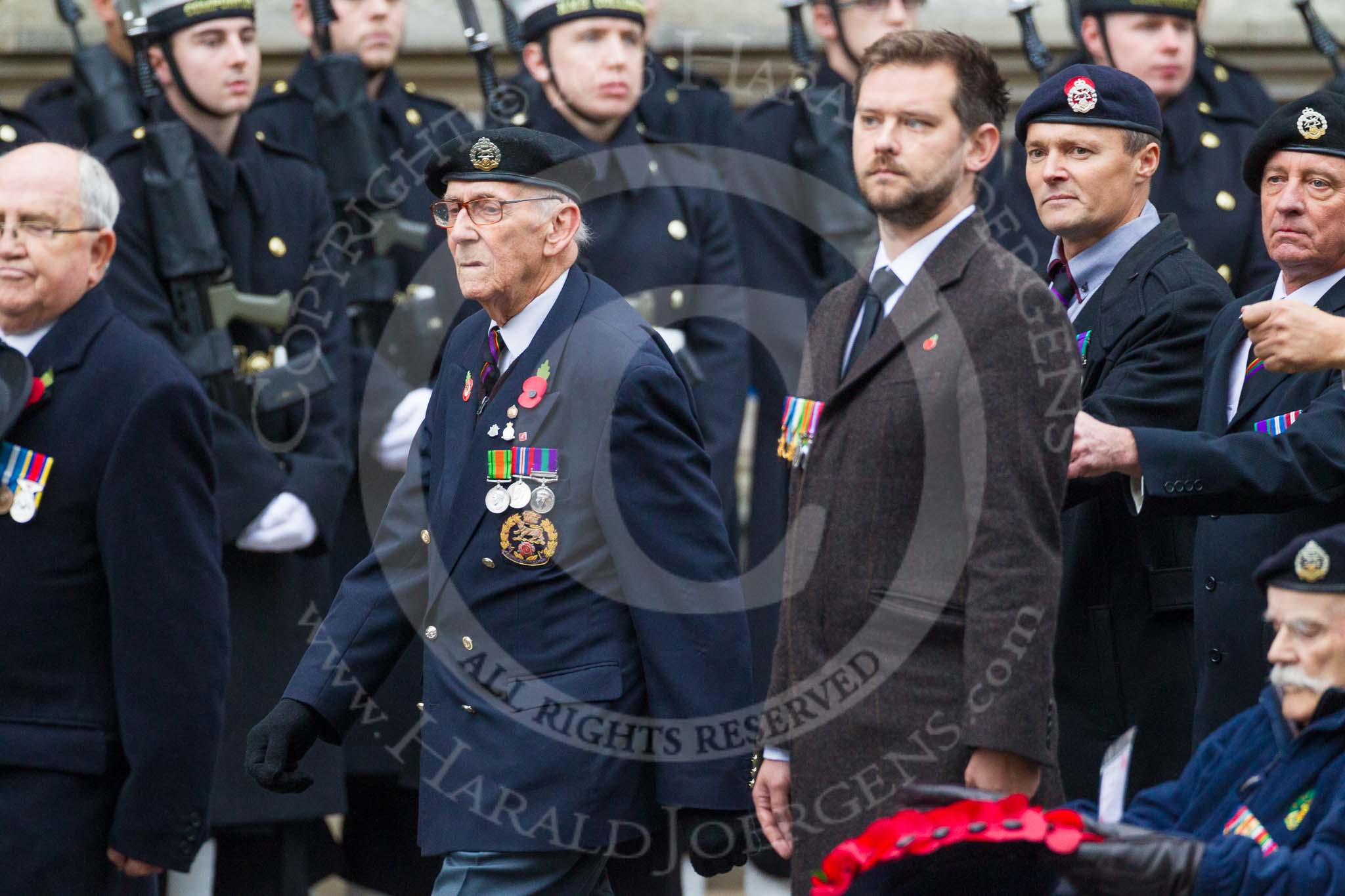 Remembrance Sunday at the Cenotaph 2015: Group A18, Royal Hampshire Regiment Comrades Association.
Cenotaph, Whitehall, London SW1,
London,
Greater London,
United Kingdom,
on 08 November 2015 at 12:12, image #1312