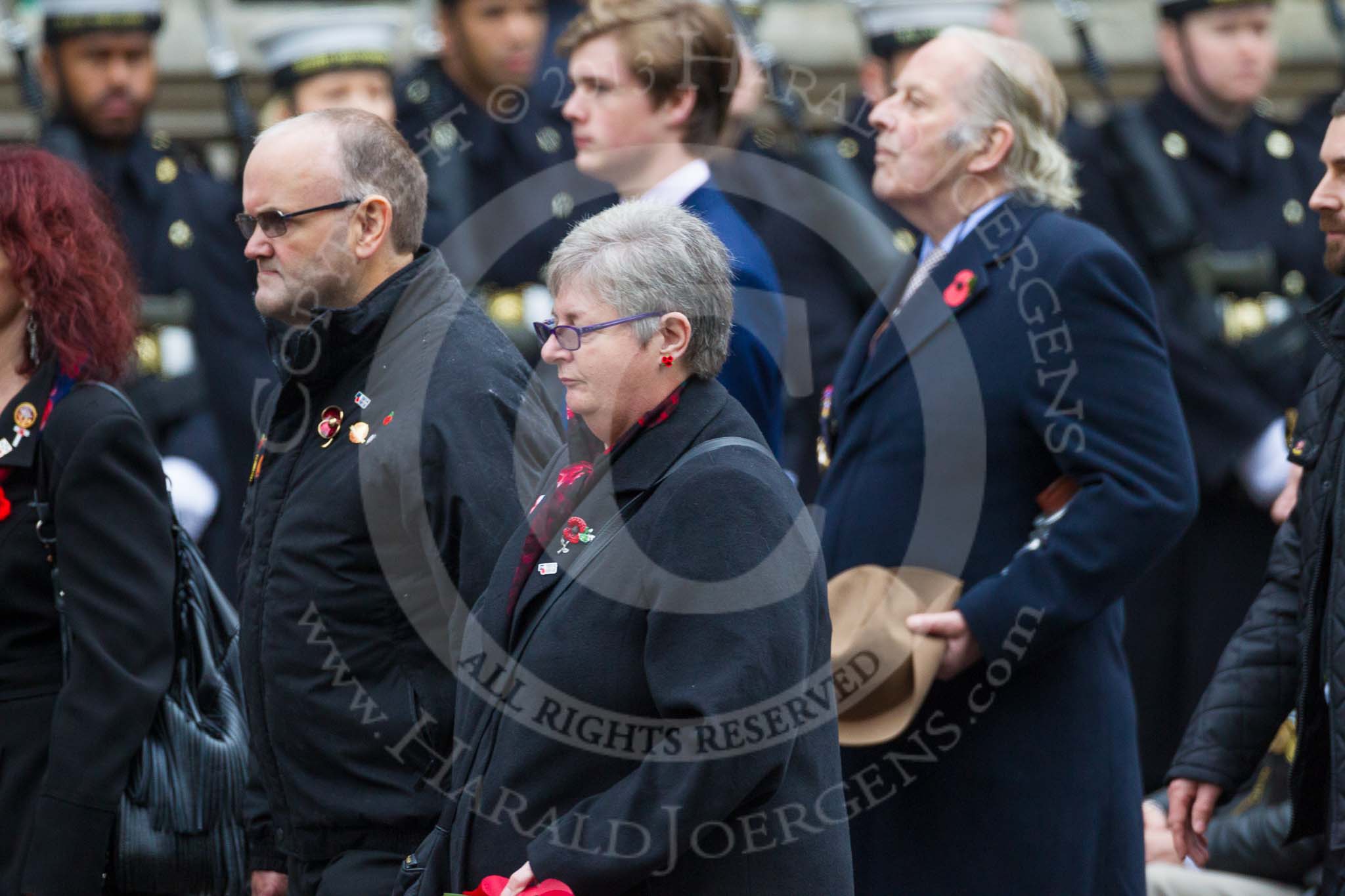 Remembrance Sunday at the Cenotaph 2015: Group M23, Civilians Representing Families.
Cenotaph, Whitehall, London SW1,
London,
Greater London,
United Kingdom,
on 08 November 2015 at 12:17, image #1574