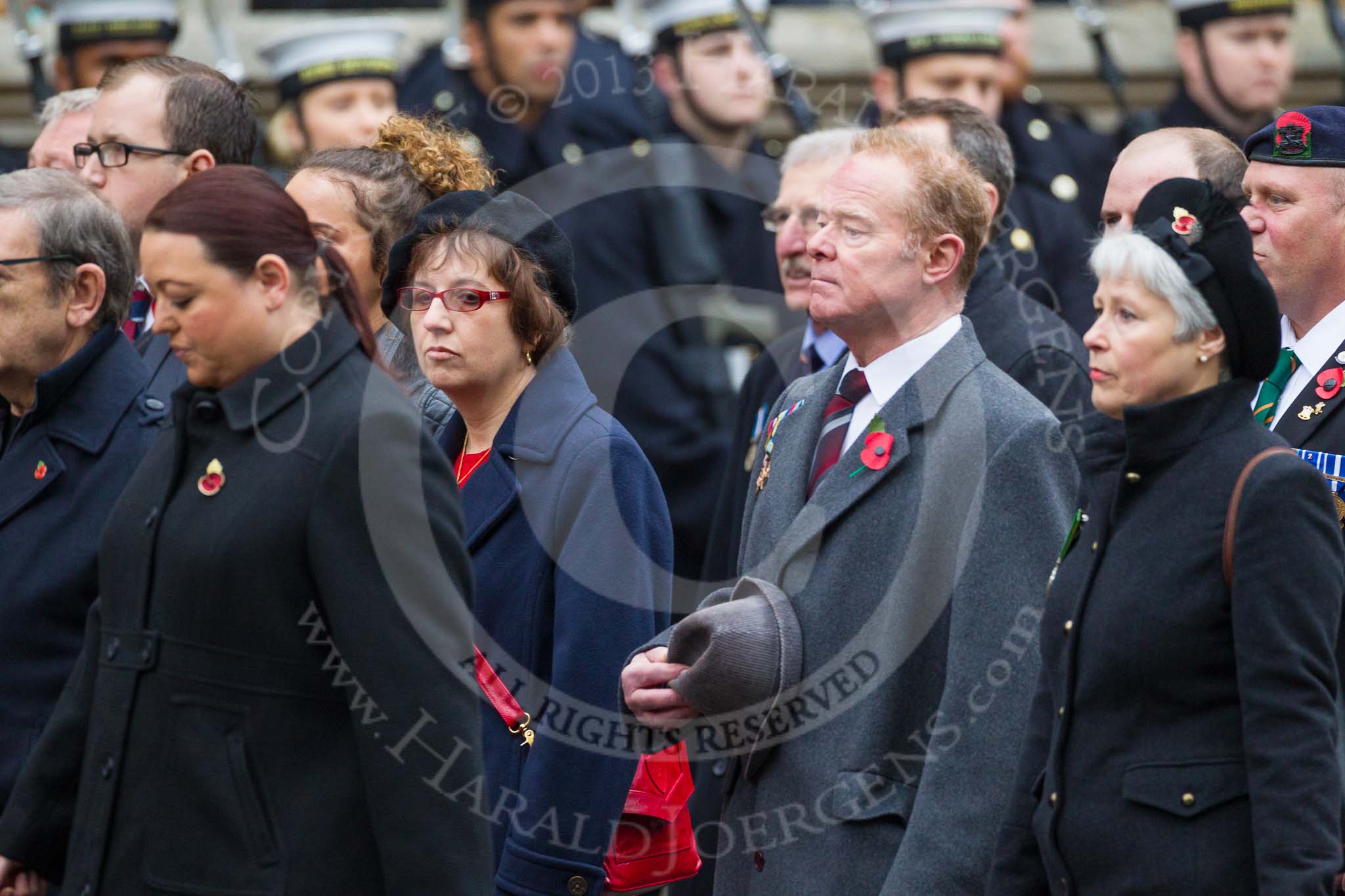 Remembrance Sunday at the Cenotaph 2015: Group M23, Civilians Representing Families.
Cenotaph, Whitehall, London SW1,
London,
Greater London,
United Kingdom,
on 08 November 2015 at 12:17, image #1581