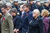 Remembrance Sunday at the Cenotaph 2015: Group M23, Civilians Representing Families.
Cenotaph, Whitehall, London SW1,
London,
Greater London,
United Kingdom,
on 08 November 2015 at 12:17, image #1565