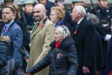 Remembrance Sunday at the Cenotaph 2015: Group M23, Civilians Representing Families.
Cenotaph, Whitehall, London SW1,
London,
Greater London,
United Kingdom,
on 08 November 2015 at 12:17, image #1571