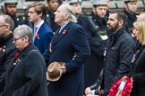 Remembrance Sunday at the Cenotaph 2015: Group M23, Civilians Representing Families.
Cenotaph, Whitehall, London SW1,
London,
Greater London,
United Kingdom,
on 08 November 2015 at 12:17, image #1575