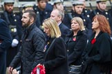 Remembrance Sunday at the Cenotaph 2015: Group M23, Civilians Representing Families.
Cenotaph, Whitehall, London SW1,
London,
Greater London,
United Kingdom,
on 08 November 2015 at 12:17, image #1576