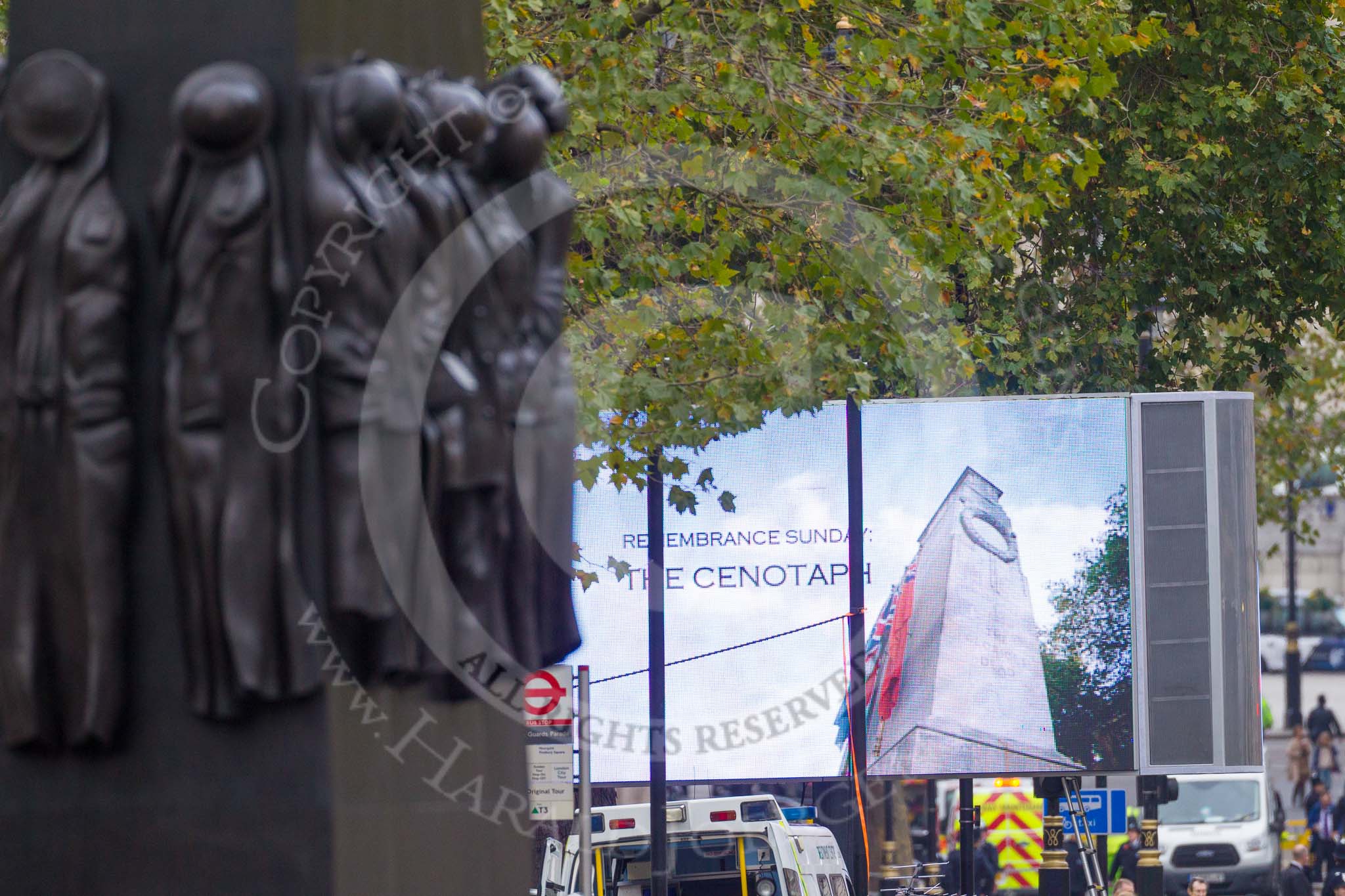 Remembrance Sunday at the Cenotaph 2015: One of the big TV screens on Whitehall, behind the Memorial for Women in World War II. Image #1, 08 November 2015 08:14 Whitehall, London, UK