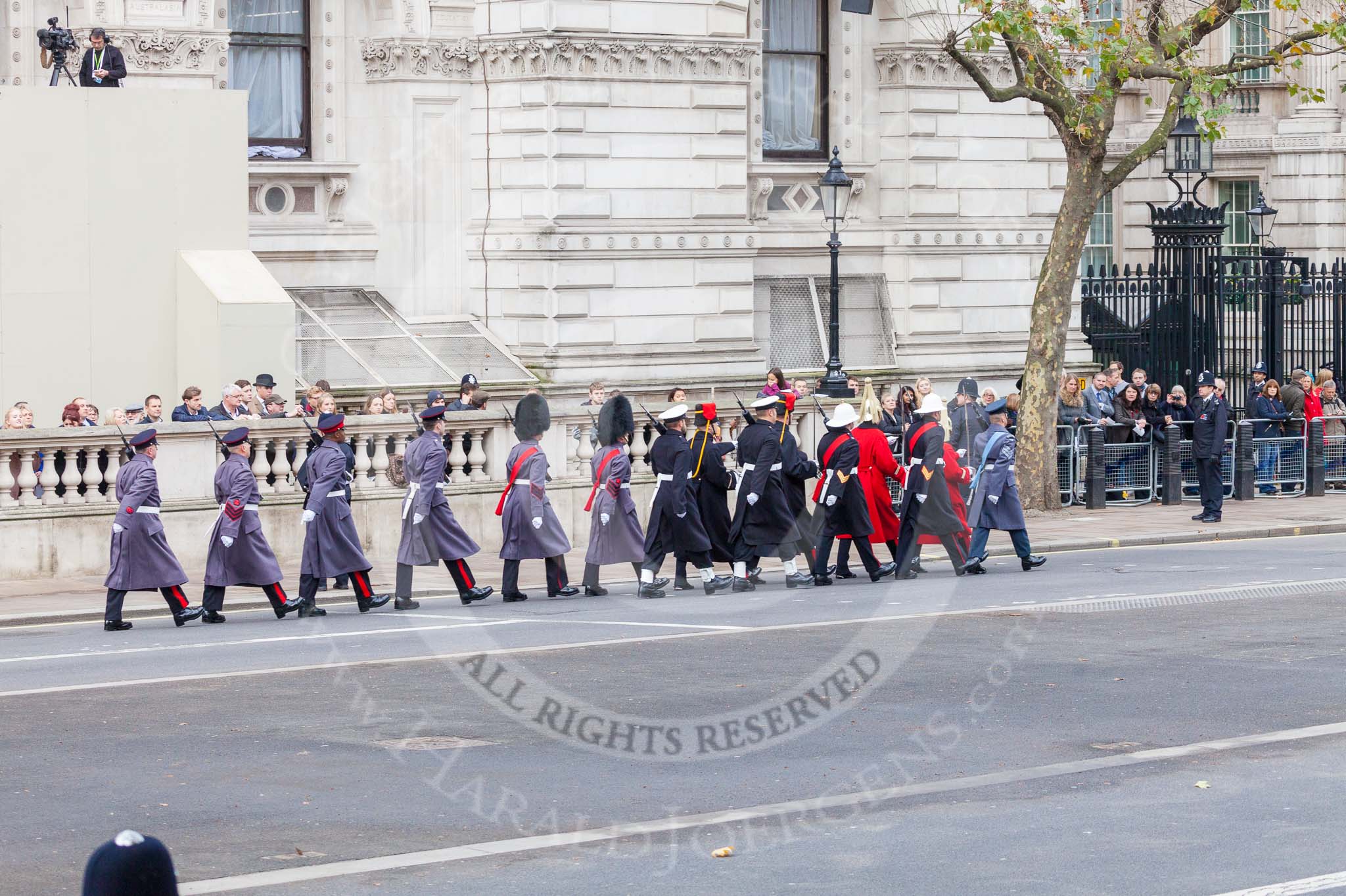 Remembrance Sunday at the Cenotaph 2015: The "marker detail personell" is marching towards Downing Street. When they return to Whitehall, they will mark the positions for the armed forces detachments that will line Whitehall. Image #16, 08 November 2015 09:41 Whitehall, London, UK