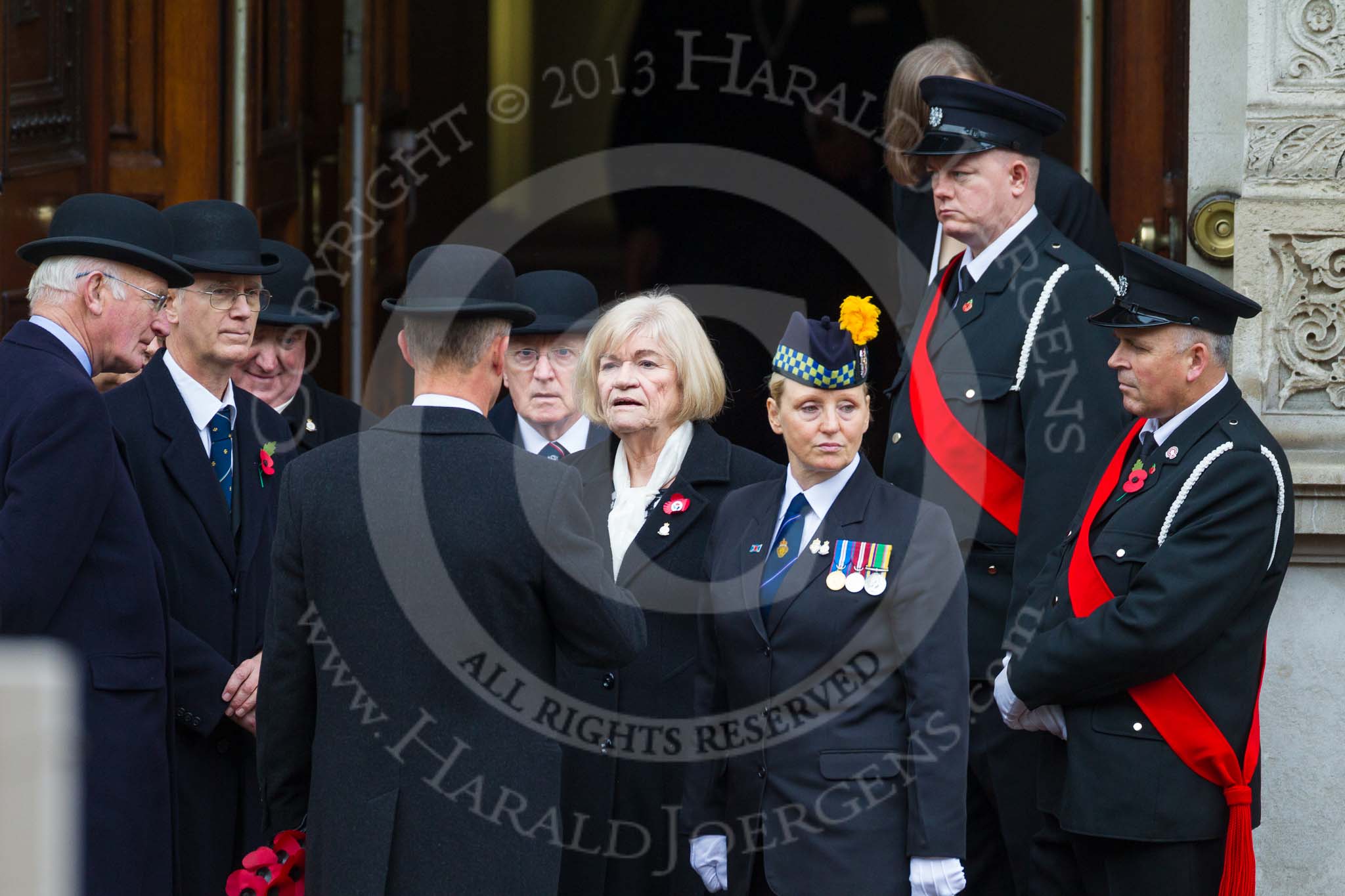Remembrance Sunday at the Cenotaph 2015: Representatives of Royal British Legion and other charities gather at the entrance of the Foreign- and Commonwealth Office Building. Image #20, 08 November 2015 09:56 Whitehall, London, UK