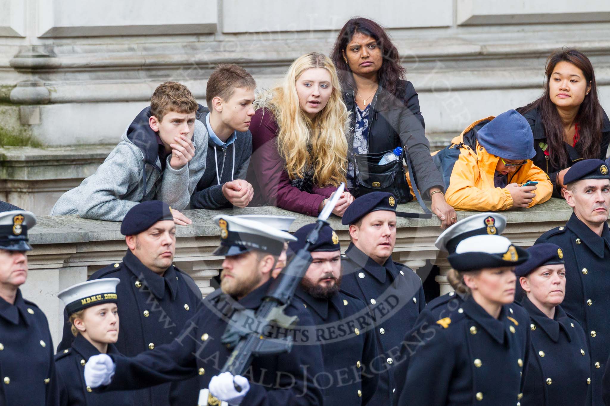 Remembrance Sunday at the Cenotaph 2015: Spectators on the Foreign Office side of Whitehall, behind the Royal Navy detachment. Image #42, 08 November 2015 10:20 Whitehall, London, UK