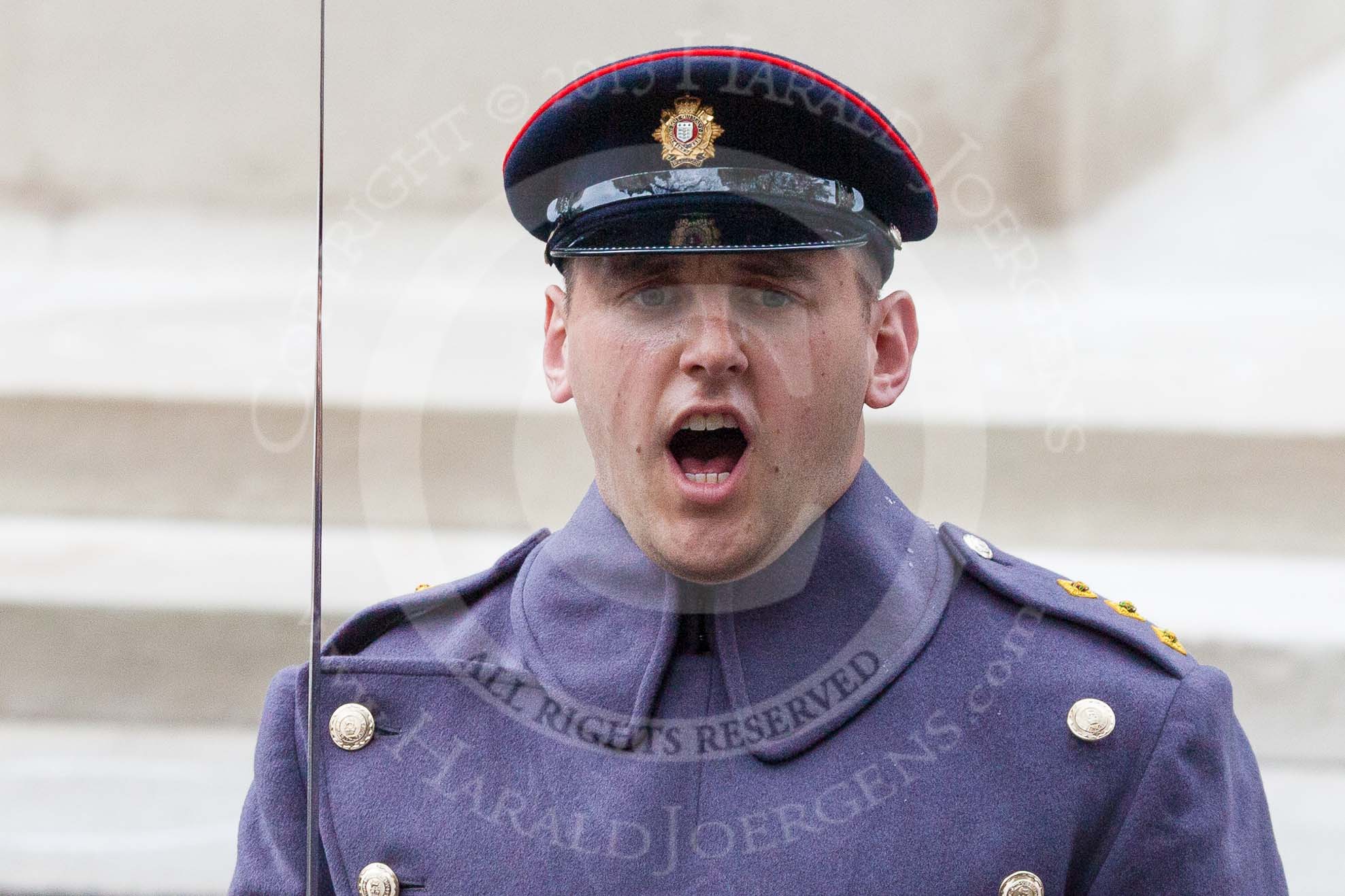 Remembrance Sunday at the Cenotaph 2015: A captain of the Royal Logistic Corps comanding his detachment of members of 4 Close Support Squadron, 4 Regiment RLC based in Abingdon. Image #56, 08 November 2015 10:31 Whitehall, London, UK
