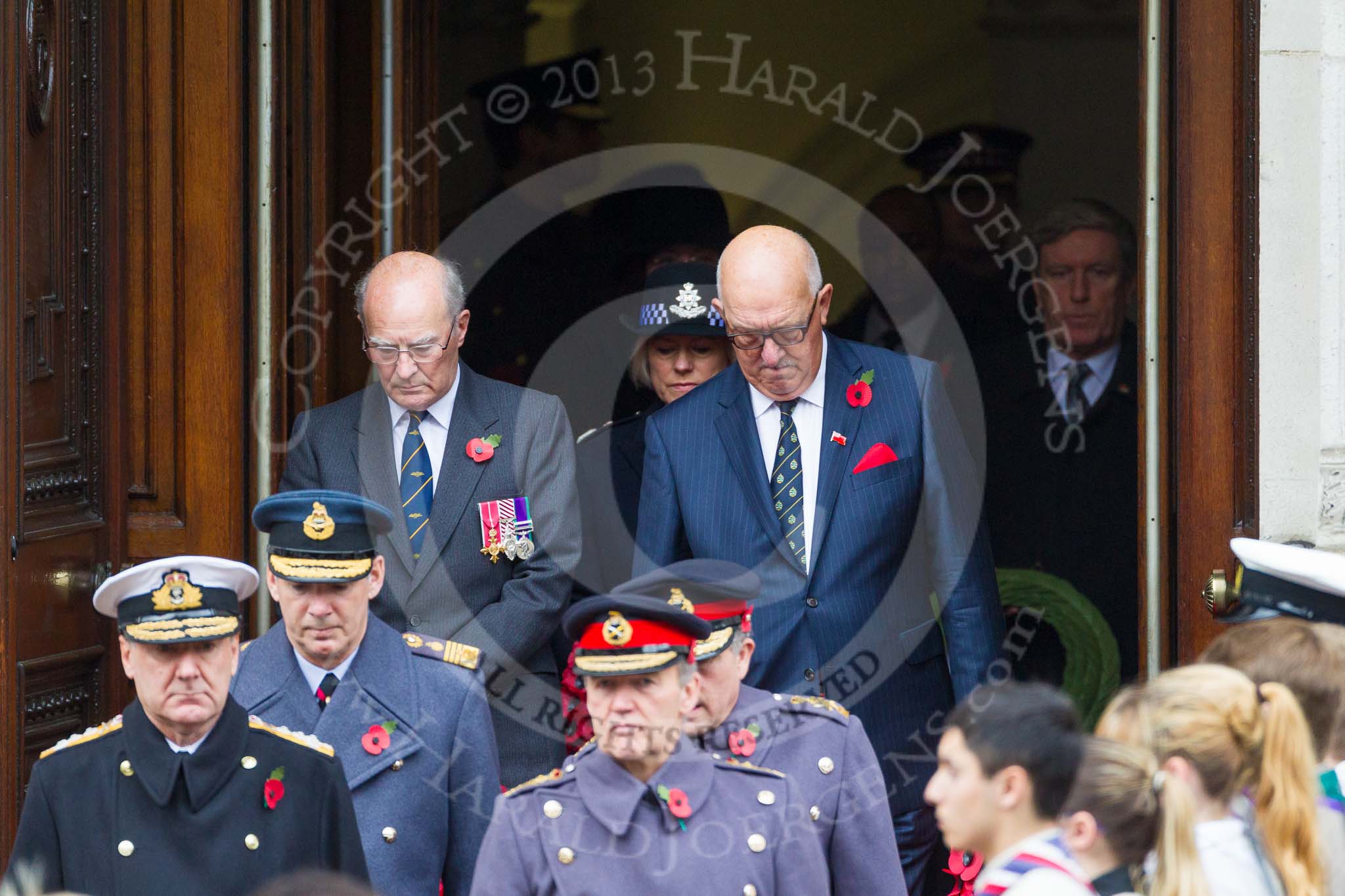 Remembrance Sunday at the Cenotaph 2015: Senior military personell leaving the Foreign- and Commonwealth Office, in front the First Sea Lord, Admiral  Sir  George  Zambellas, and the Chief of the Defence Staff, General  Sir  Nicholas  Houghton. Behind them the Chief of Air Staff, Air  Chief  Marshall  Sir  Andrew  Pulford, next to him the Chief of the General Staff, General Sir Nicholas
Carter. Behind them Air Commodore John Lumsden, Captain Jim Conybeare,and Sara Thornton, HM Government’s National
Police Chief's Council Chair. Image #92, 08 November 2015 10:55 Whitehall, London, UK