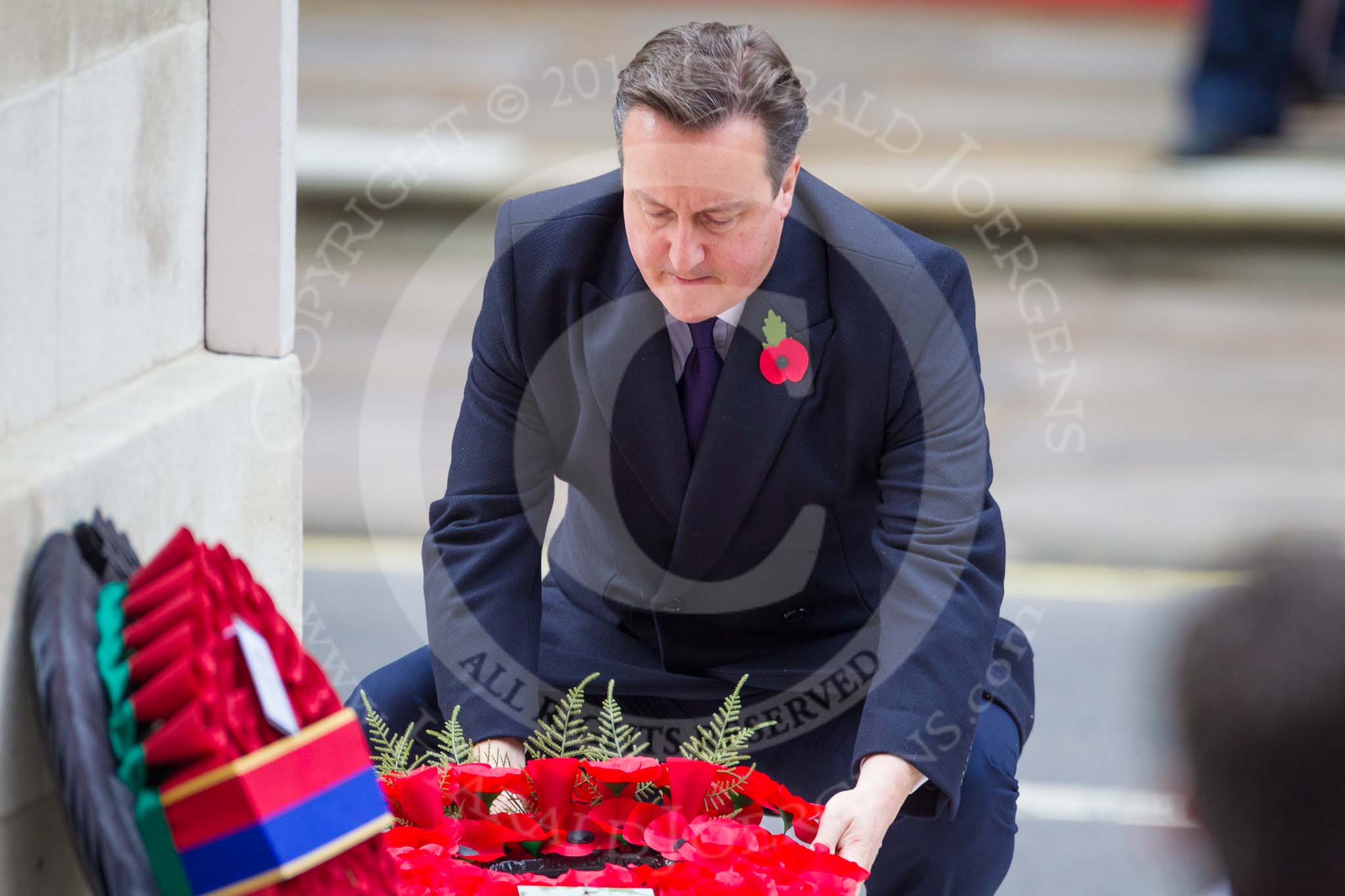 Remembrance Sunday at the Cenotaph 2015: The Prime Minister, David Cameron, laying his wreath at the Cenotaph. Image #206, 08 November 2015 11:06 Whitehall, London, UK