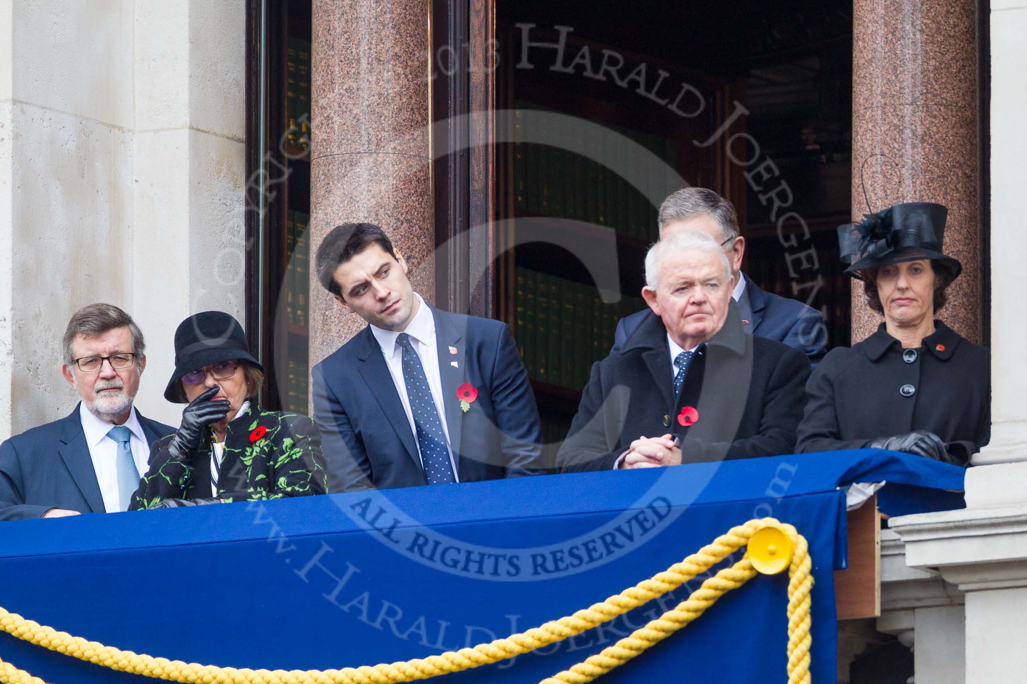 Remembrance Sunday at the Cenotaph 2015: Guests watching the ceremony from one of the balconies of the Foreign- and Commonwealth Office. Image #254, 08 November 2015 11:11 Whitehall, London, UK