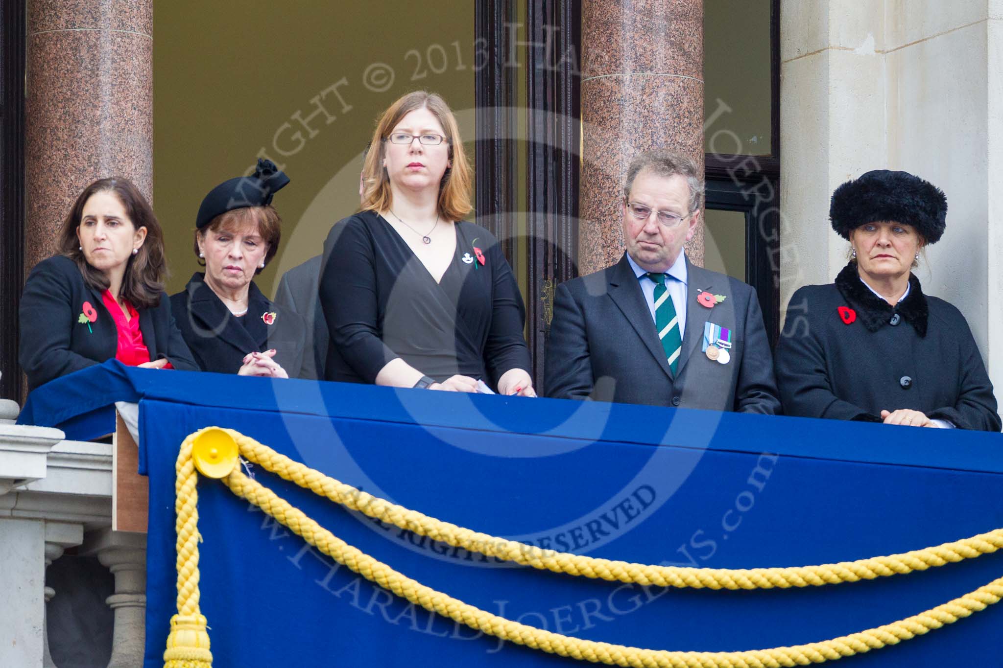 Remembrance Sunday at the Cenotaph 2015: Guests watching the ceremony from one of the balconies of the Foreign- and Commonwealth Office. Image #260, 08 November 2015 11:12 Whitehall, London, UK