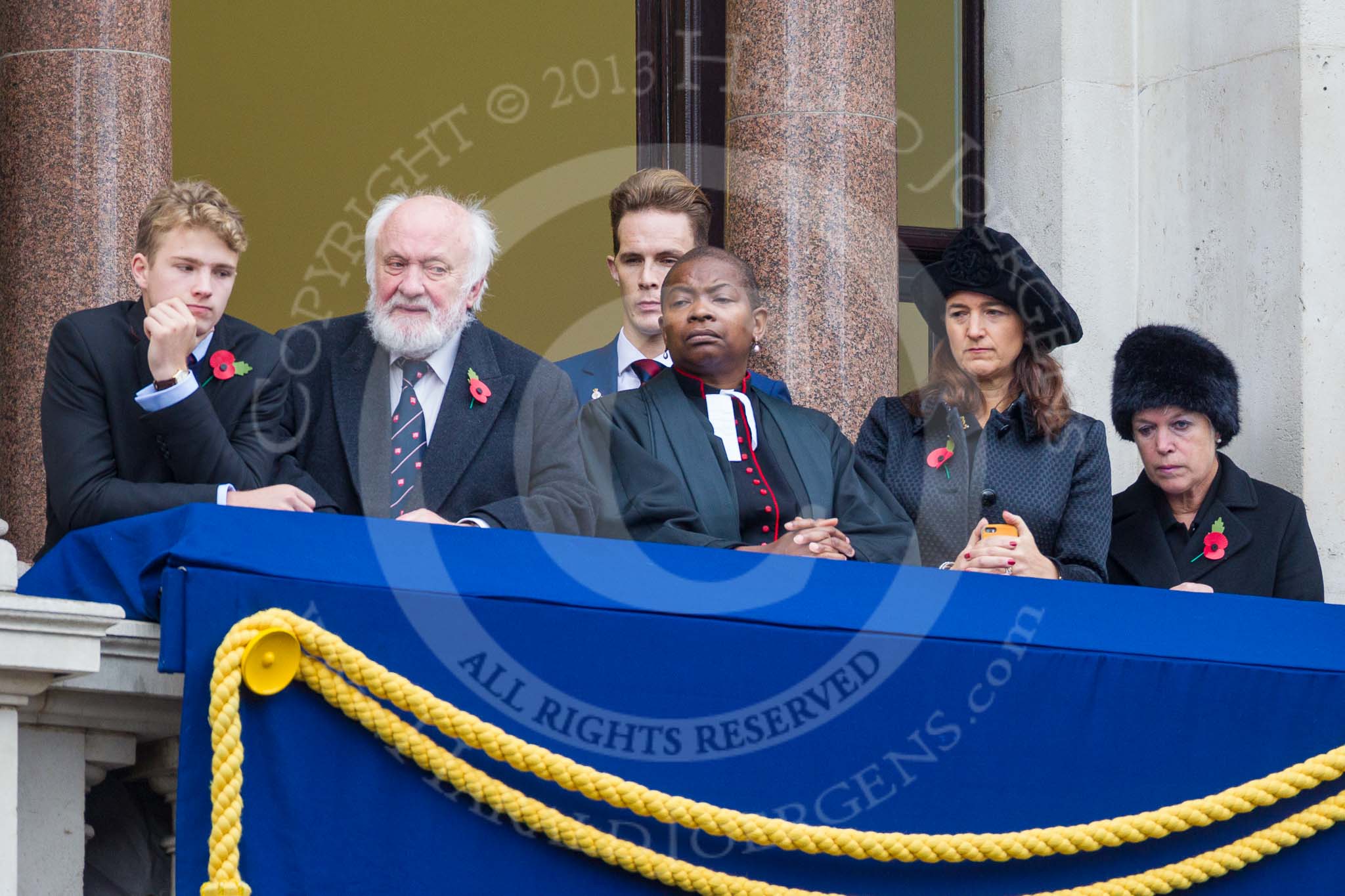 Remembrance Sunday at the Cenotaph 2015: Guests watching the ceremony from one of the balconies of the Foreign- and Commonwealth Office. Image #261, 08 November 2015 11:12 Whitehall, London, UK