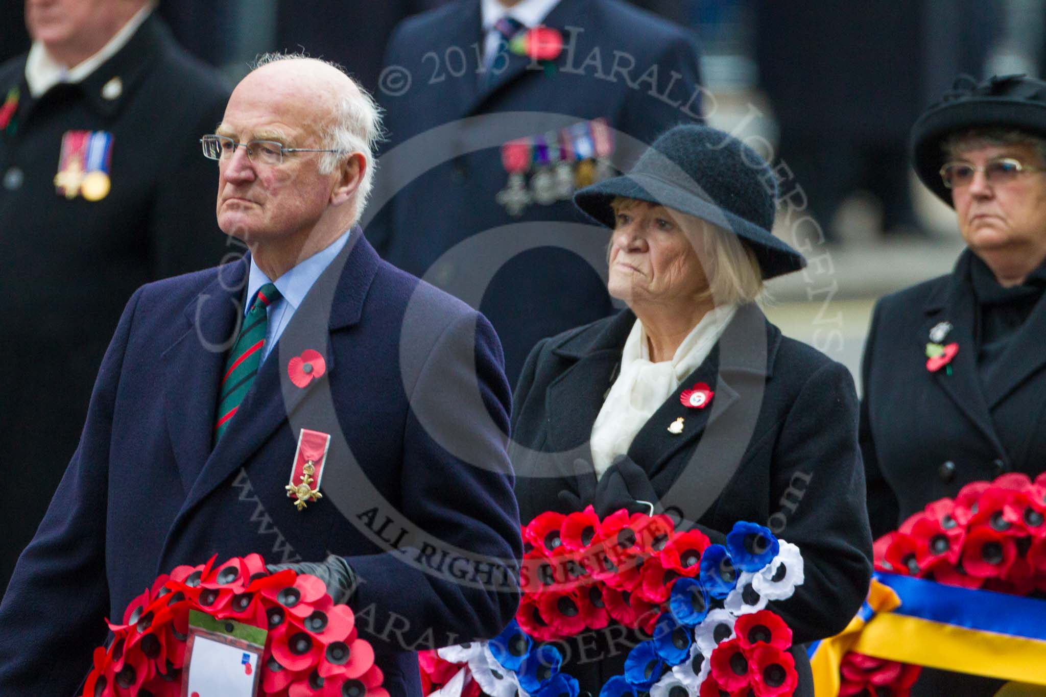 Remembrance Sunday at the Cenotaph 2015: On the way to the Cenotaph to lay their wreaths: Patrick Mitford-Slade for the Royal Commonwealth Ex-Services League, Jan Harvey for Royal British Legion Scotland and Marilyn Humphry for the Royal British Legion Women’s Section. Image #341, 08 November 2015 11:25 Whitehall, London, UK