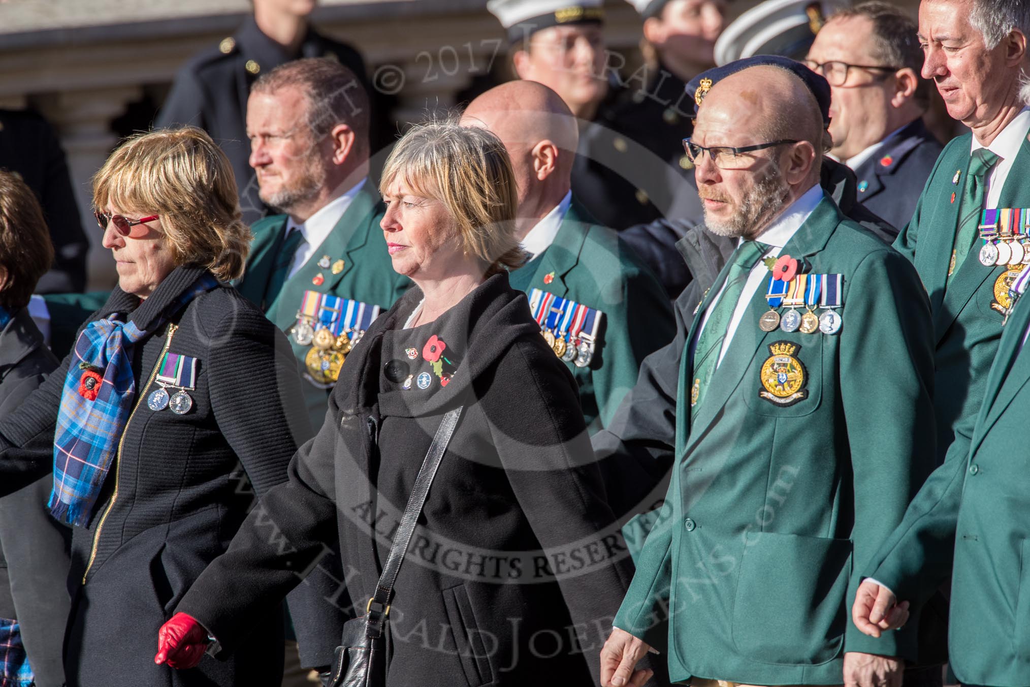 Fleet Air Arm Junglies Association  (Group E12, 22 members) during the Royal British Legion March Past on Remembrance Sunday at the Cenotaph, Whitehall, Westminster, London, 11 November 2018, 11:43.