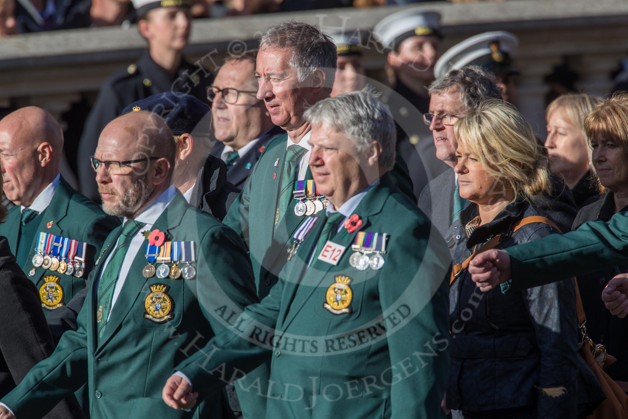Fleet Air Arm Junglies Association  (Group E12, 22 members) during the Royal British Legion March Past on Remembrance Sunday at the Cenotaph, Whitehall, Westminster, London, 11 November 2018, 11:43.